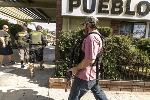 Orange County Sheriff agents search the back_83352