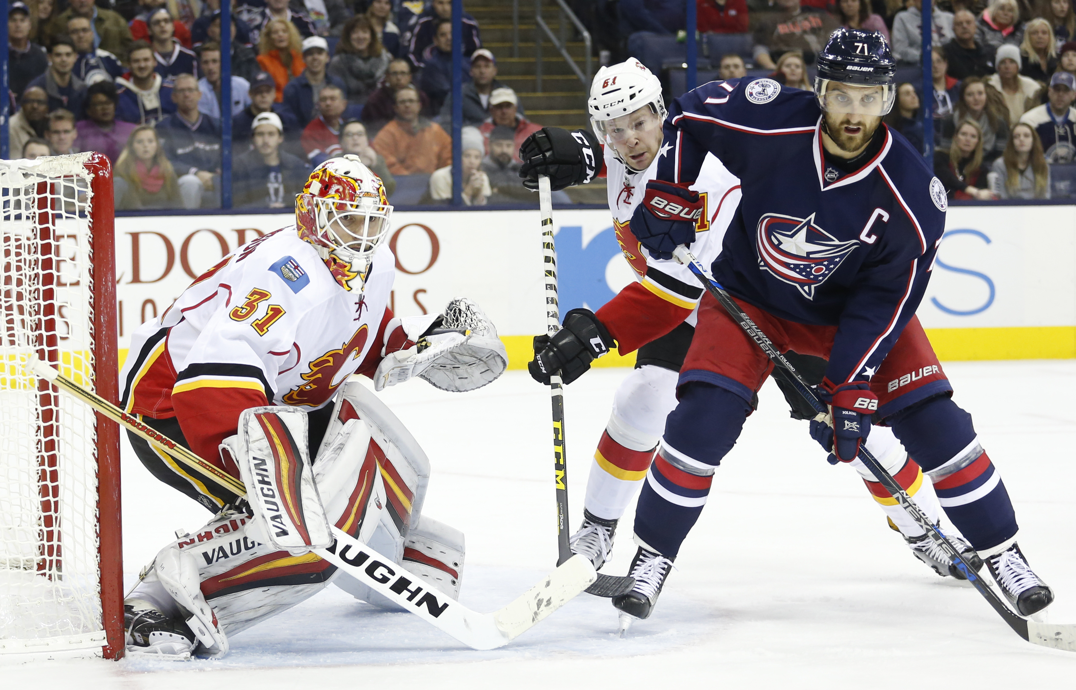 Chad Johnson, Brett Kulak, Nick Foligno_211678