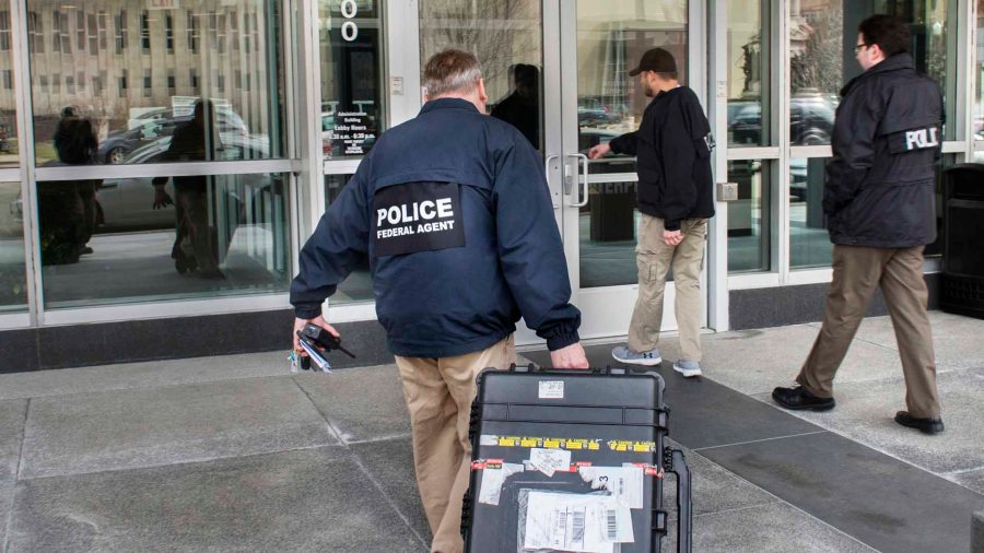 APTOPIX Caterpillar Search Warrant_261284