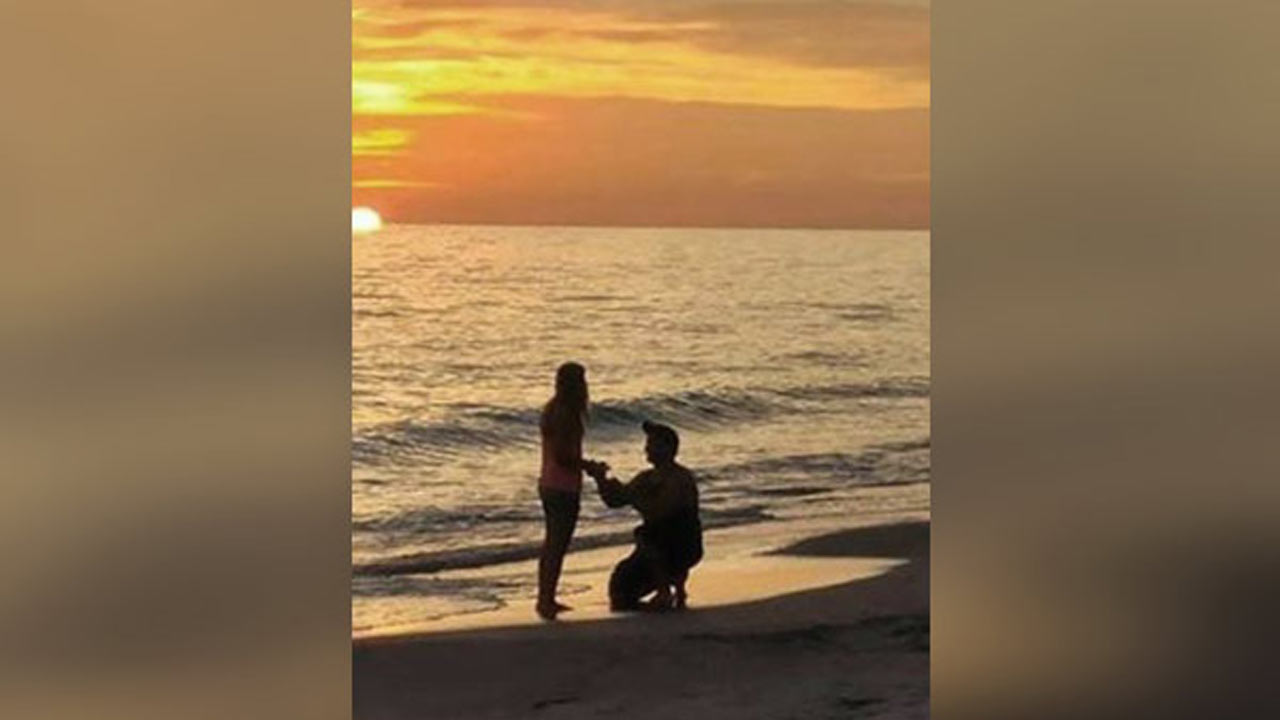 engaged-couple_330995