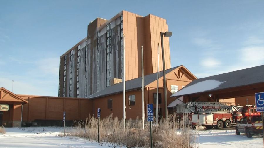 A photo of the former 12-story Fort Rapids Indoor Waterpark Resort with ice forming on the side of its building