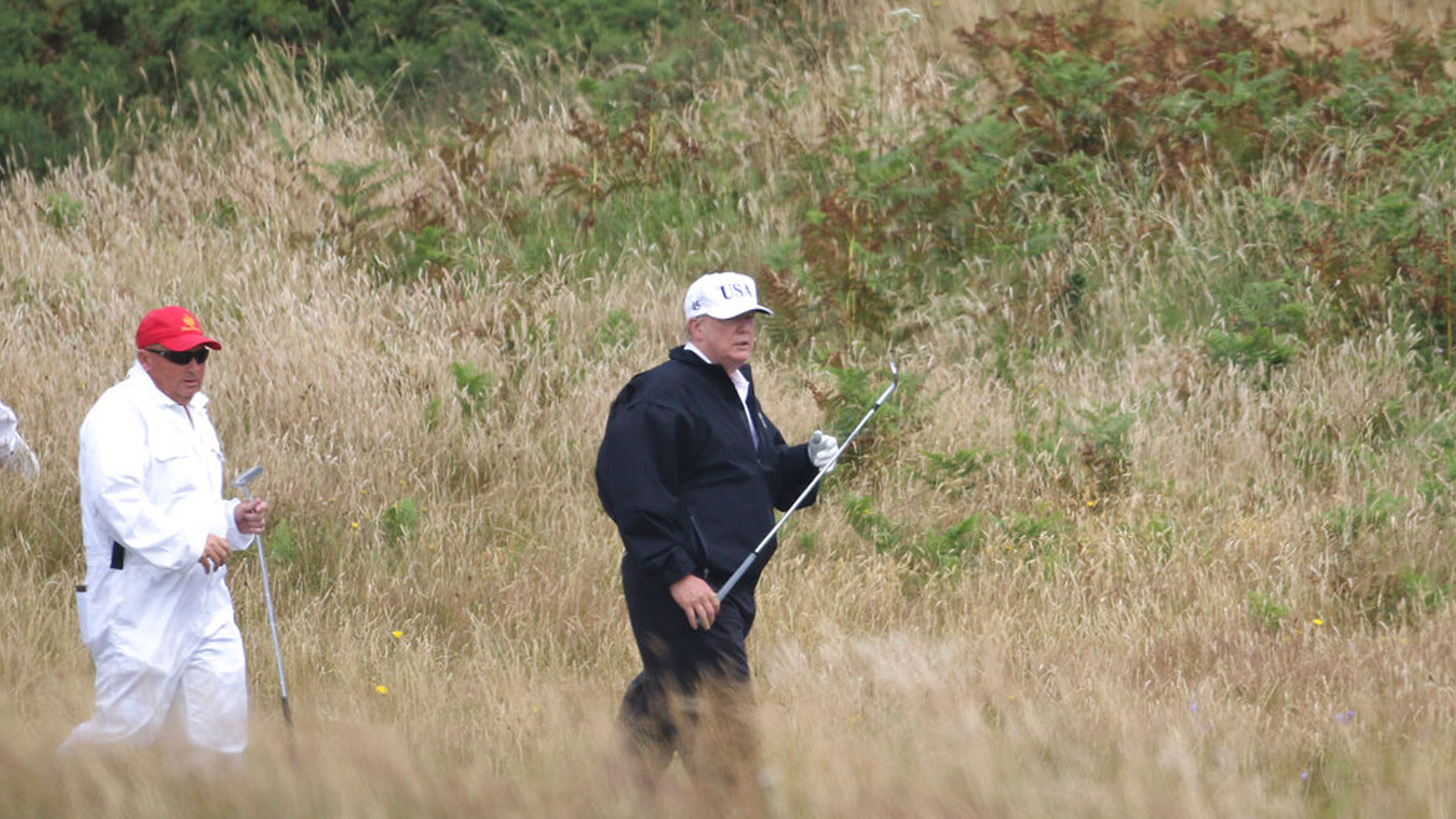 trump-golfing-scotland_1531575495051.jpg