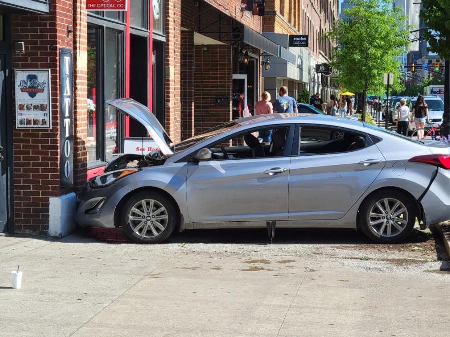 Uber driver crashes into tattoo shop