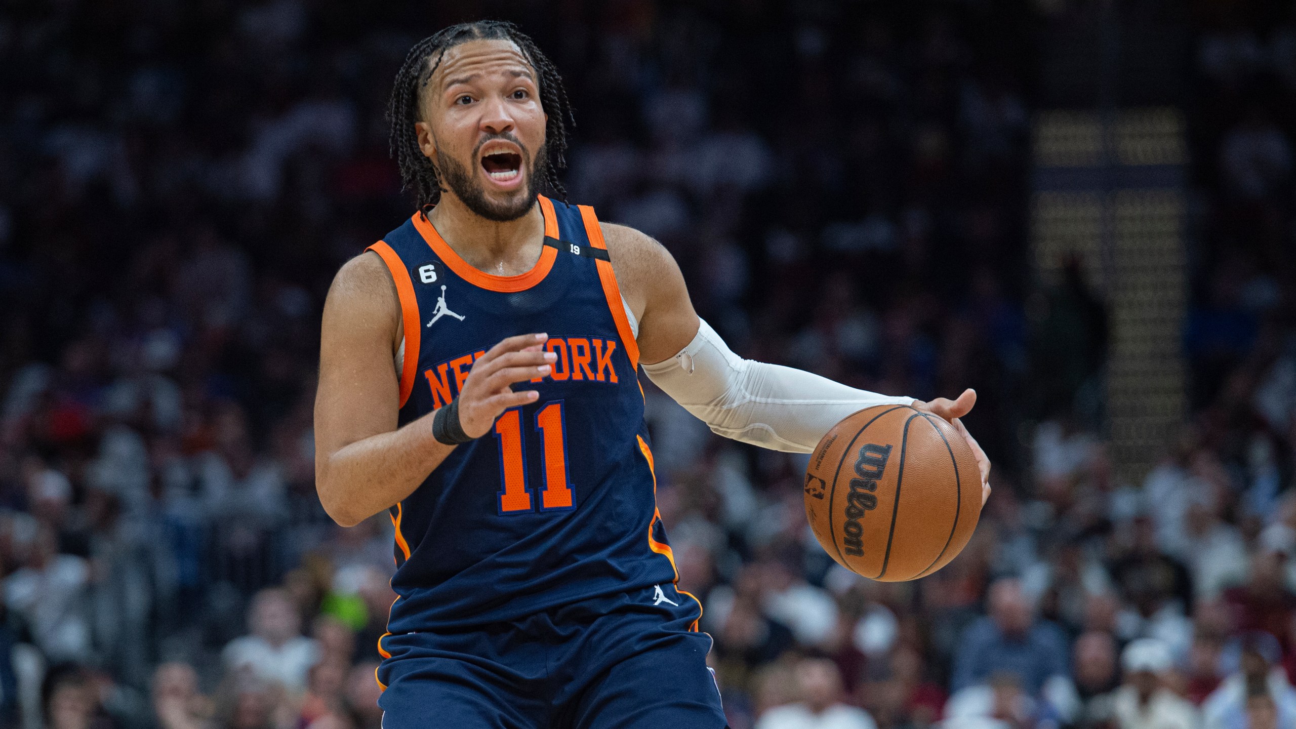 New York Knicks' Jalen Brunson (11) calls a play against the Cleveland Cavaliers during the second half of Game 5 of an NBA basketball first-round playoff series Wednesday, April 26, 2023, in Cleveland. The Knicks won 106-95 and took the series. (AP Photo/Phil Long)
