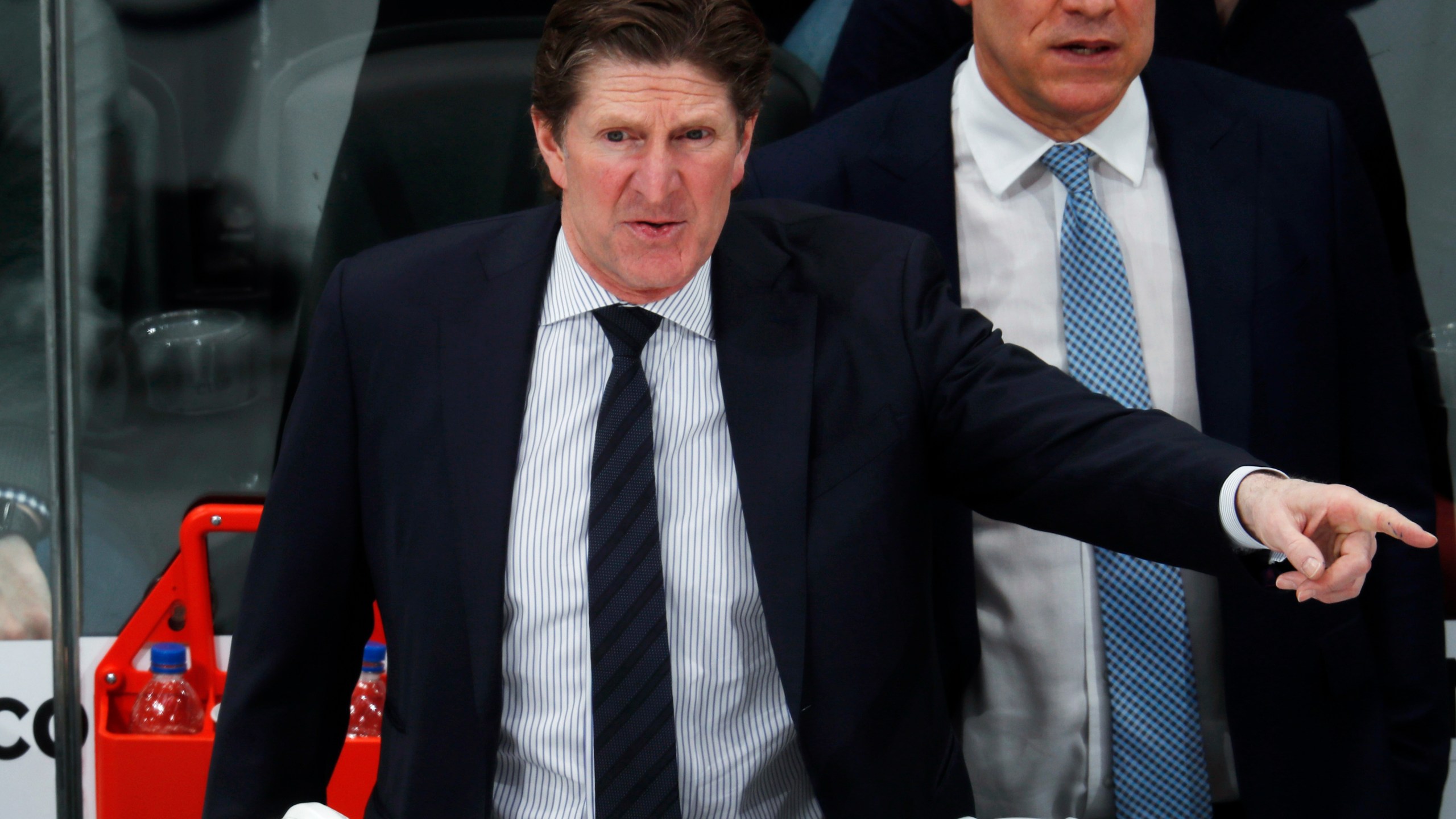 FILE - Toronto Maple Leafs head coach Mike Babcock directs his team against the Colorado Avalanche in the third period of an NHL hockey game, Tuesday, Feb. 12, 2019, in Denver. Babcock is back in the NHL as coach of the Columbus Blue Jackets. The Blue Jackets announced Saturday, July 1, 2023, they’ve hired the Stanley Cup winner to take over behind the bench. (AP Photo/David Zalubowski)