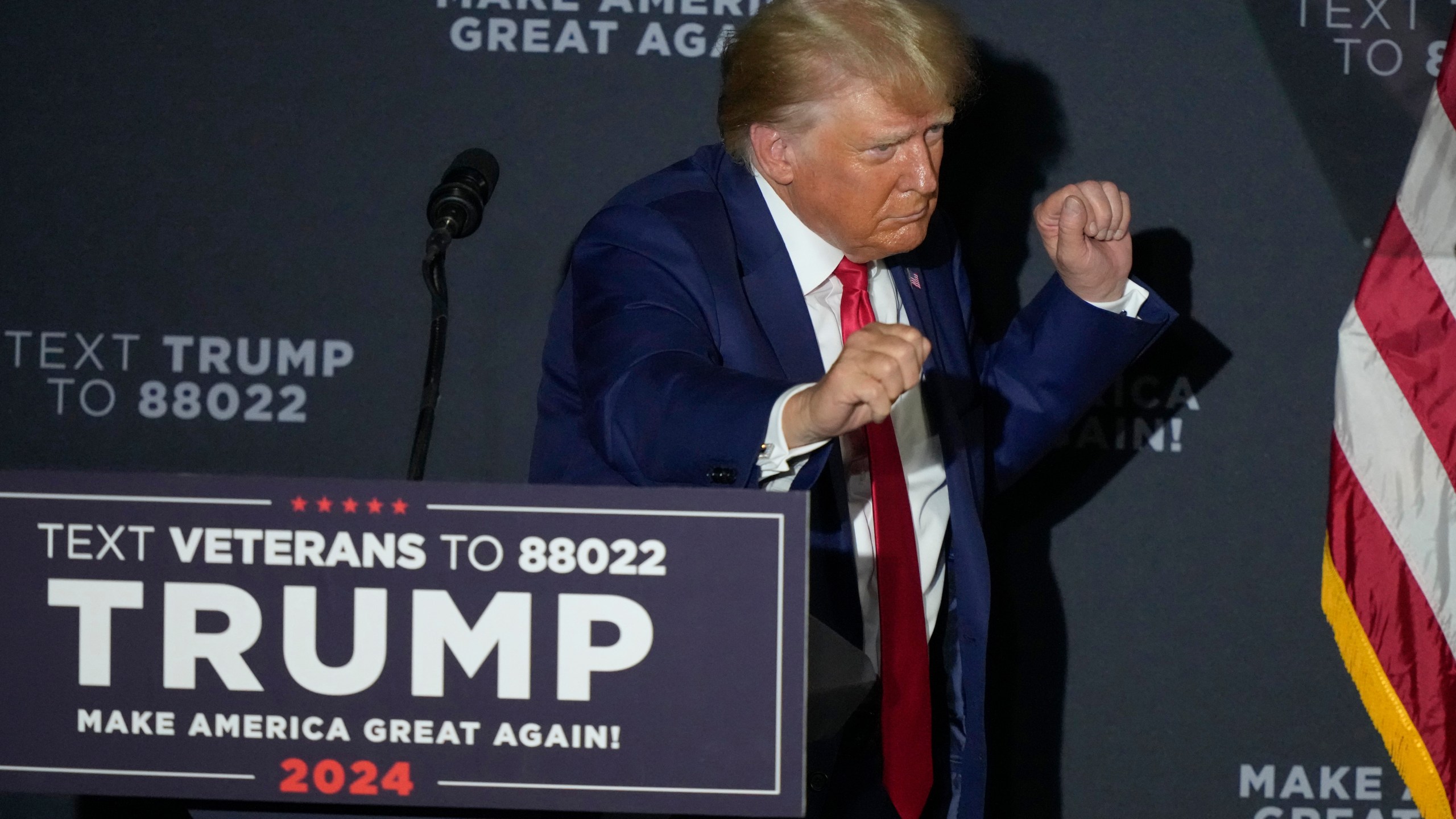 Republican president candidate former President Donald Trump dances at the conclusion of his remarks at a campaign rally, Tuesday Aug. 8, 2023, at Windham High School in Windham, N.H. (AP Photo/Robert F. Bukaty)