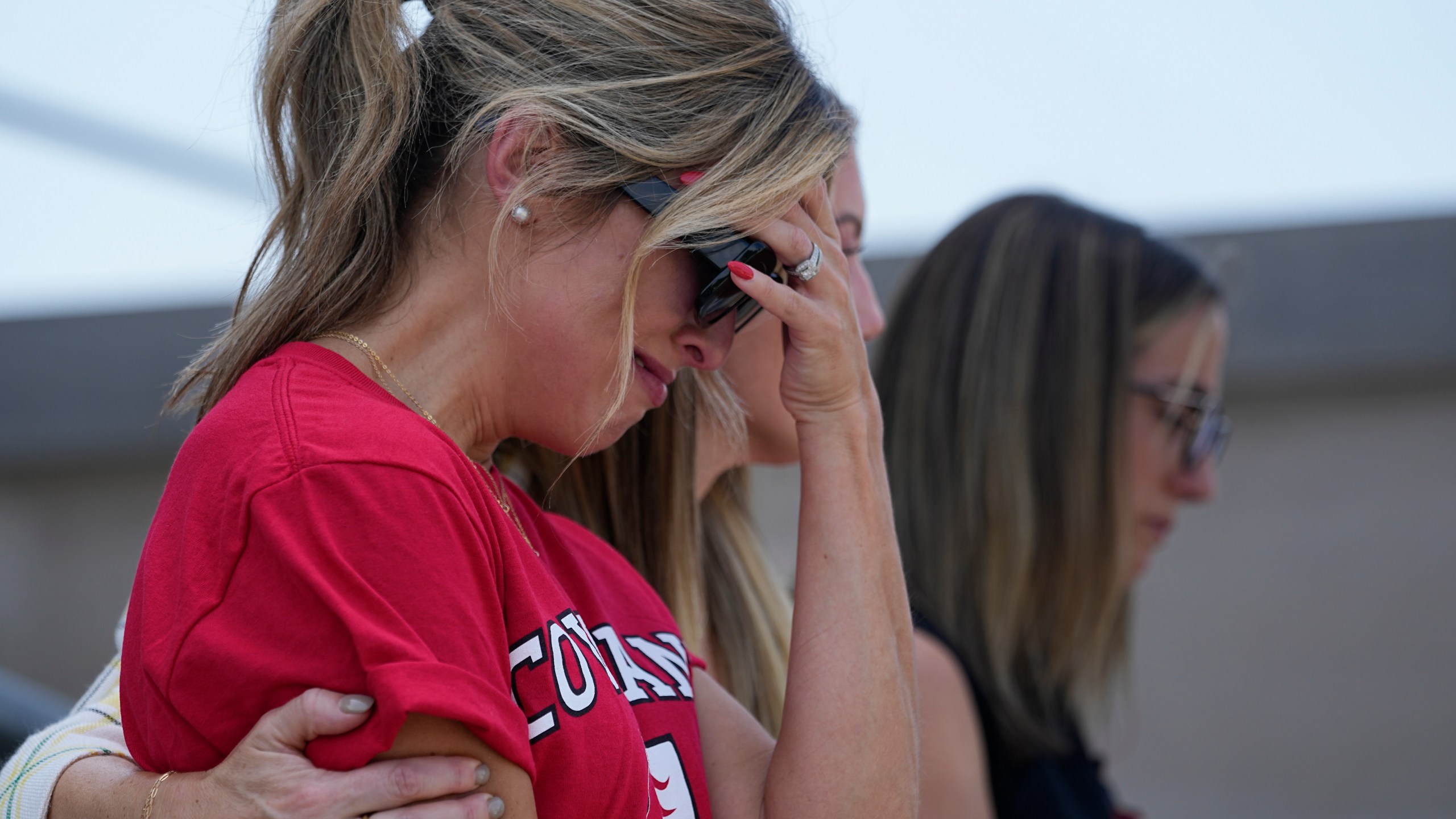 Covenant School parent Mary Joyce gets emotional during a Covenant Families Action Fund news conference on the steps of the State Capitol before a special session of the state legislature on public safety Monday, Aug. 21, 2023, in Nashville, Tenn. (AP Photo/George Walker IV)