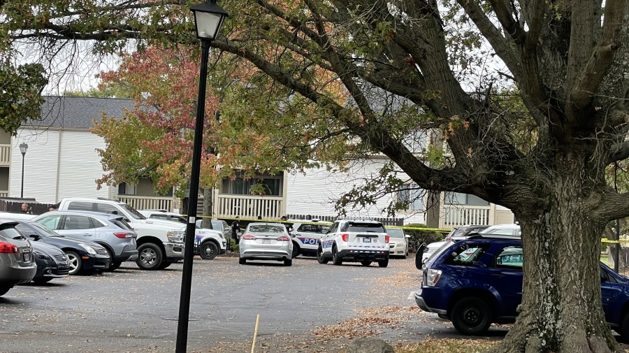 Columbus police set up crime scene tape outside of an apartment where a shooting took place Oct. 5, 2023. (NBC4 Photo/Anna Hoffman)