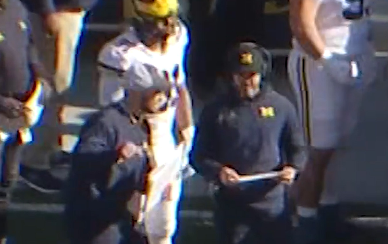 In an NBC4 image of the 2022 Ohio State-Michigan game, Connor Stalions is seen talking to Michigan defensive coordinator Jesse Minter (NBC4)