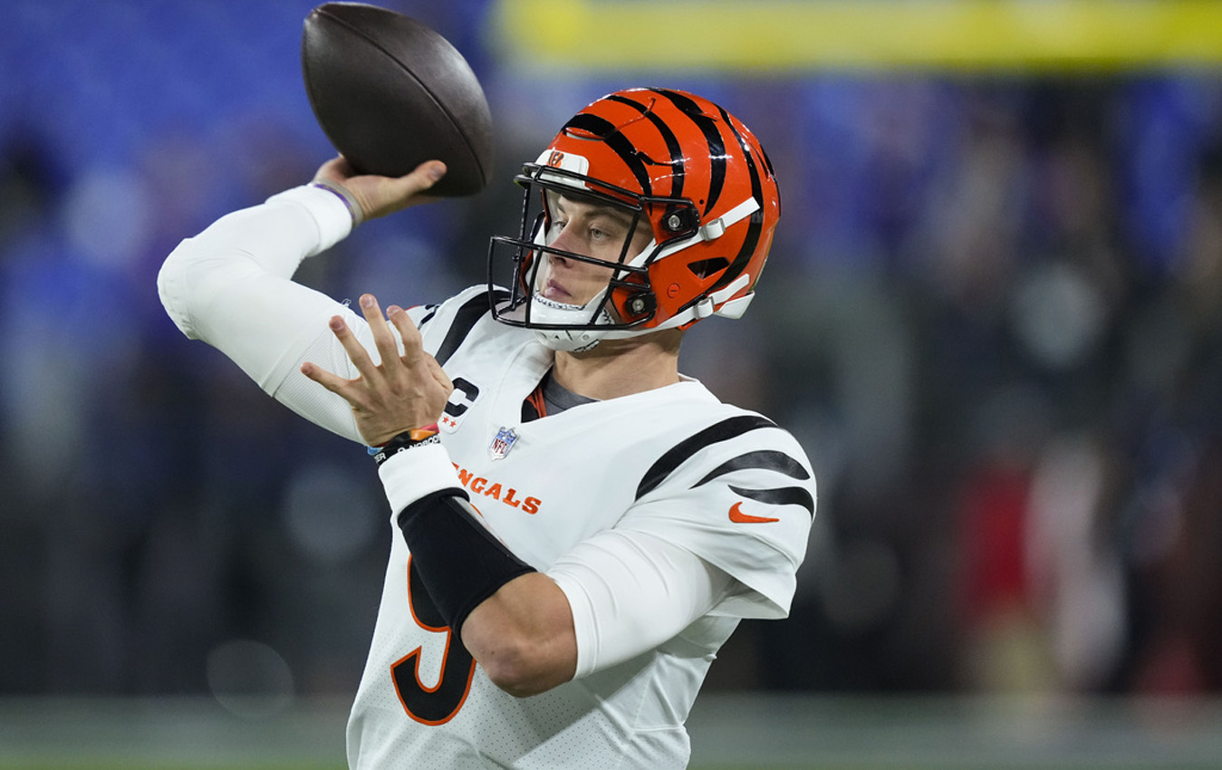 Cincinnati Bengals quarterback Joe Burrow (9) pass the ball during warmups before an NFL football game against the Baltimore Ravens in Baltimore, Thursday, Nov. 16, 2023. (AP Photo/Matt Rourke)