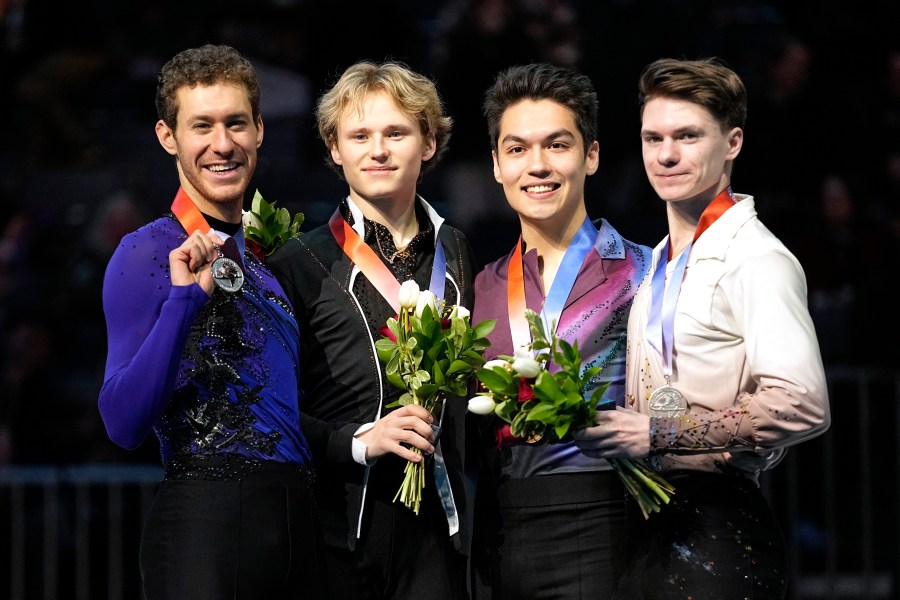 From left, Jason Brown, silver medalist, Ilia Malinin, gold medalist, Camden Pulkinen, bronze medalist and Maxim Naumov, pewter medalist, pose at the U.S. figure skating championships, Sunday, Jan. 28, 2024, in Columbus, Ohio. (AP Photo/Sue Ogrocki)