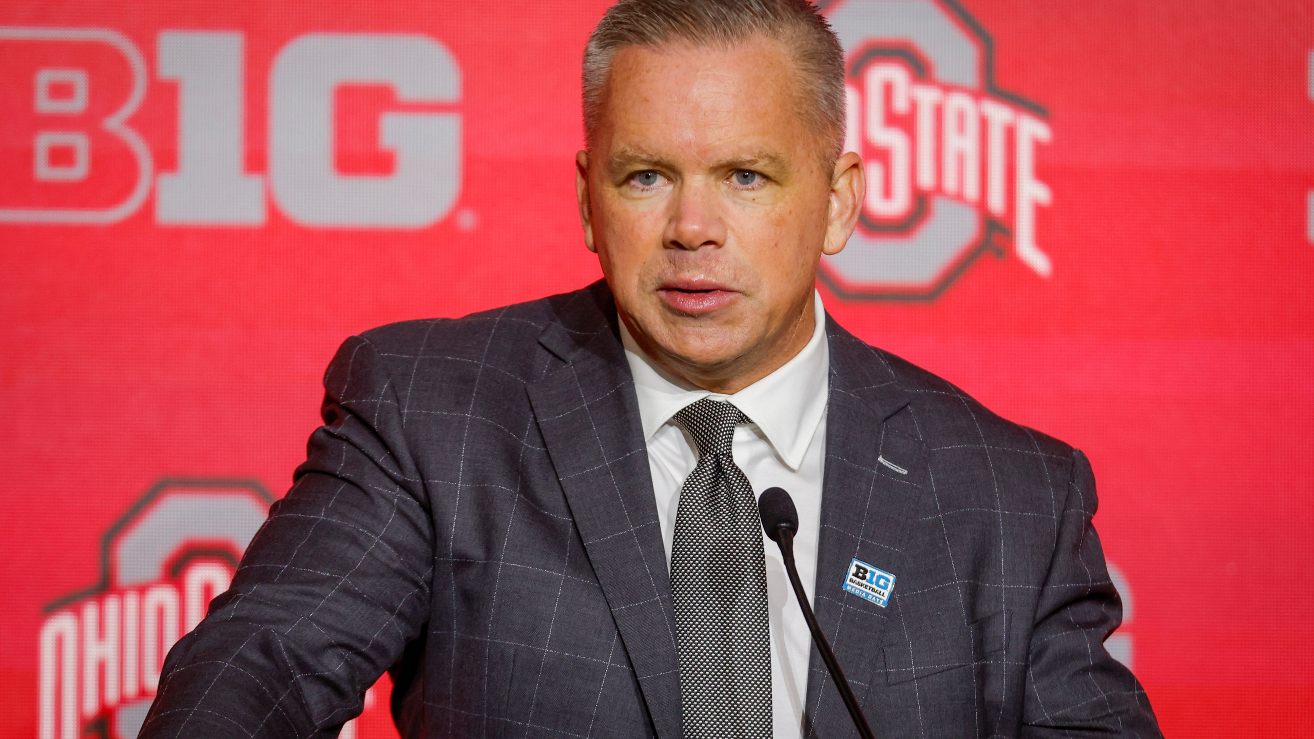 FILE - Ohio State head coach Chris Holtmann speaks during Big Ten NCAA college basketball Media Days Tuesday, Oct. 10, 2023, in Minneapolis. Ohio State fired seventh-year basketball coach Chris Holtmann on Wednesday, Feb. 14, 2024, with the Buckeyes mired in yet another subpar season. Associate head coach Jake Diebler will run the program for the rest of the season and a search for a new head coach will commence then, the school said in a statement. (AP Photo/Bruce Kluckhohn, File)