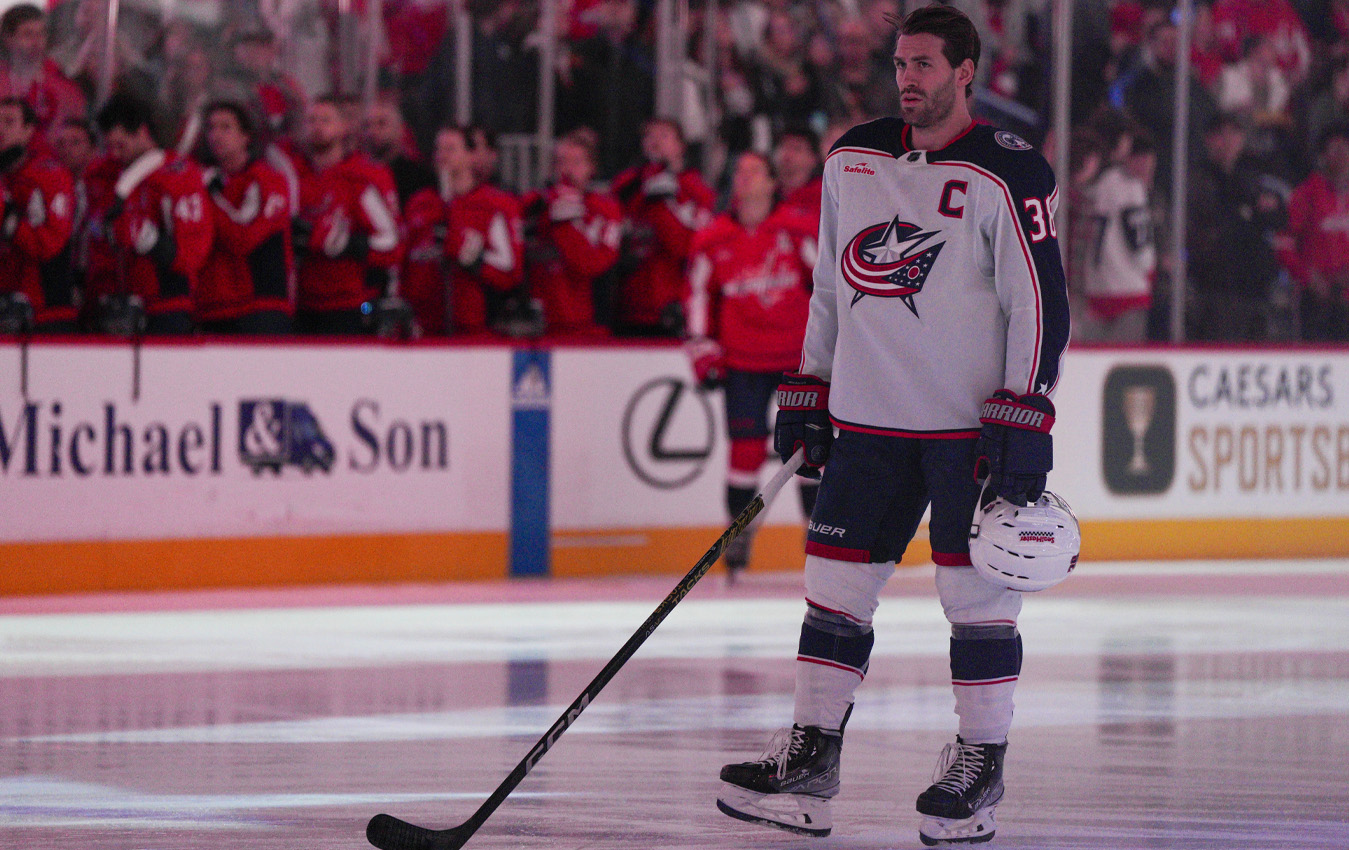 Columbus Blue Jackets center Boone Jenner stands during the national anthem before an NHL hockey game against the Washington Capitals, Saturday, Nov. 4, 2023, in Washington. (AP Photo/Jess Rapfogel)