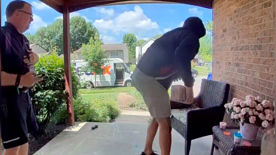 A security camera captures the moment a suspect stole a package right in front of the FedEx driver that dropped it off. (Courtesy Photo/Kyle Dorsch)