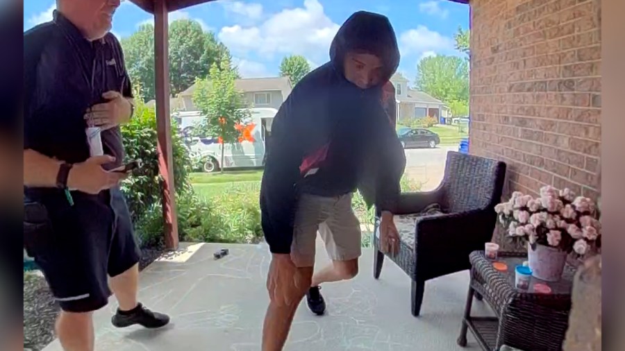 A security camera captures the moment a suspect stole a package right in front of the FedEx driver that dropped it off. (Courtesy Photo/Kyle Dorsch)