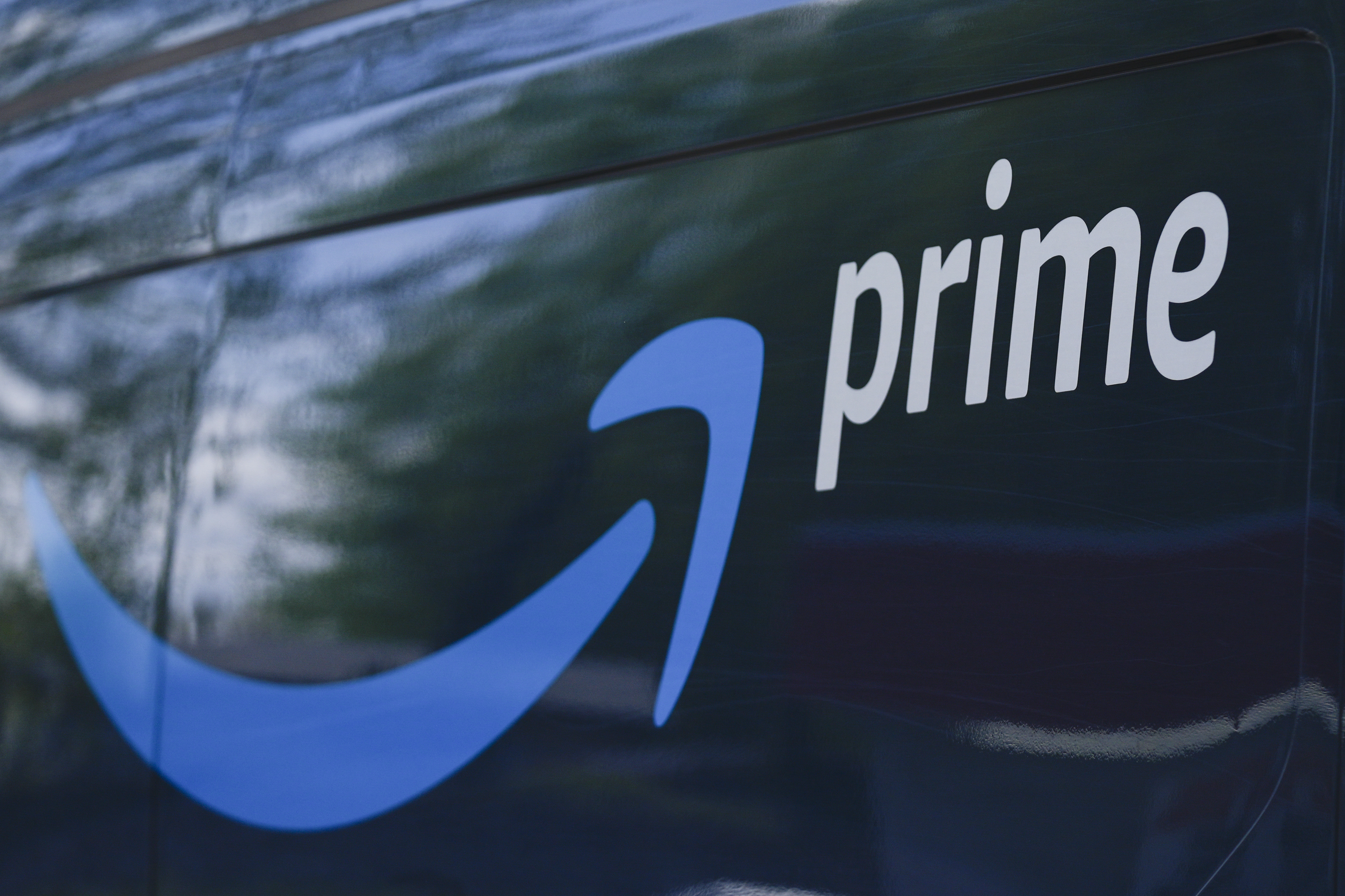 FILE - An Amazon Prime truck is seen on April 5, 2024, in Portland, Ore. Amazon hits a stock market valuation of $2 trillion for the first time on Wednesday, June 26, 2024.(AP Photo/Jenny Kane, File)