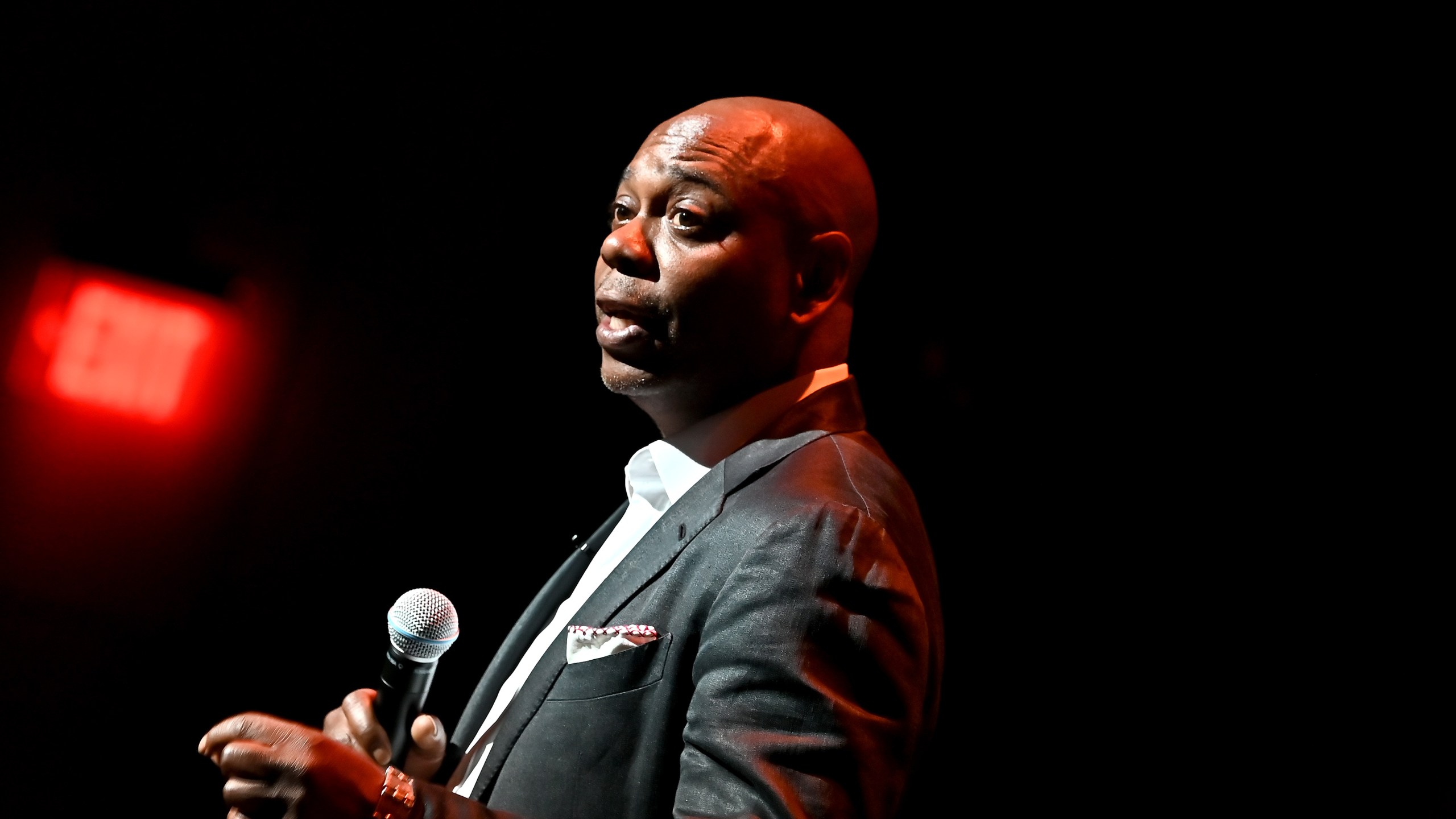 WASHINGTON, DC - JUNE 20: Dave Chappelle performs onstage during the Dave Chappelle theatre dedication ceremony at Duke Ellington School of the Arts on June 20, 2022 in Washington, DC. (Photo by Shannon Finney/Getty Images)