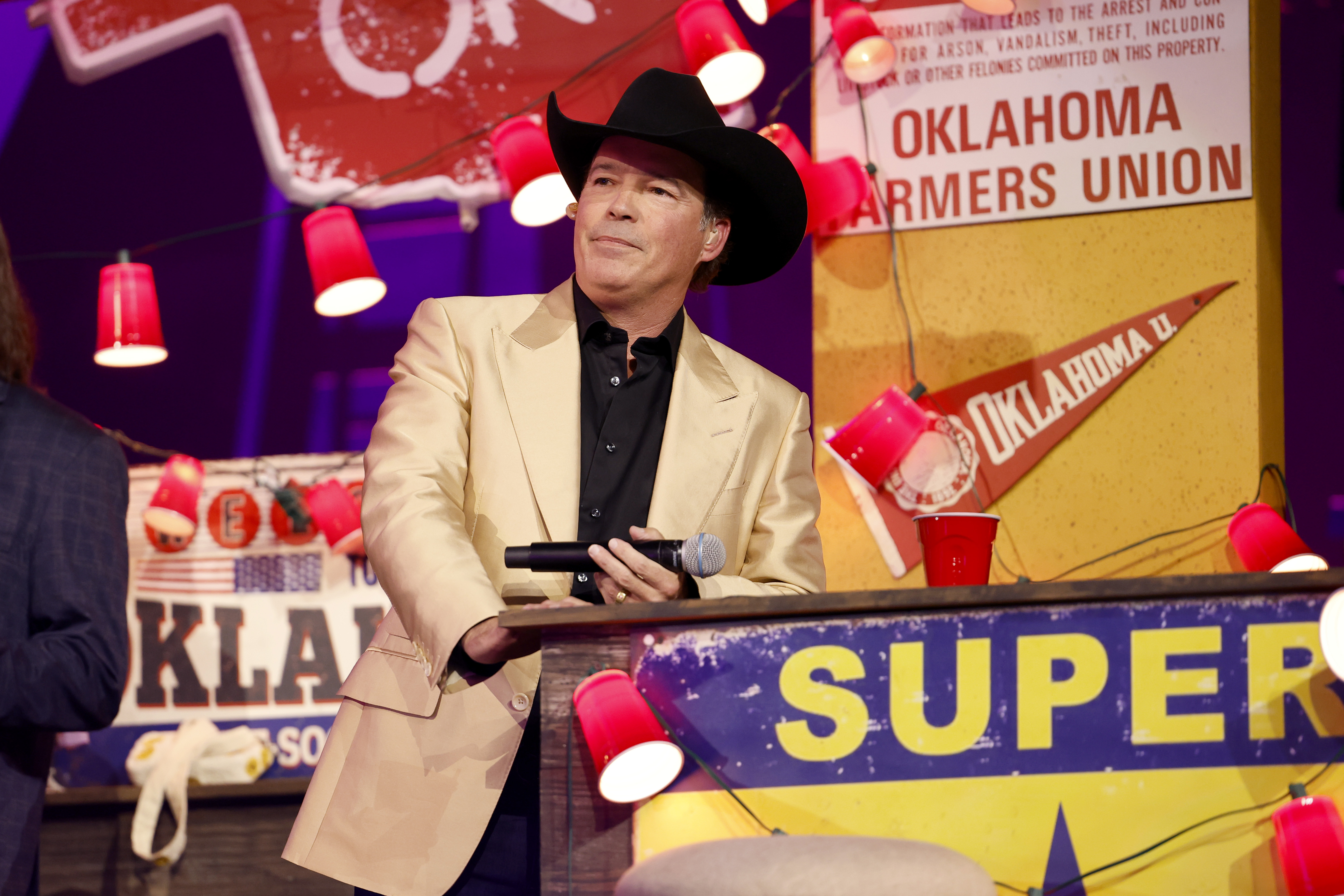 NASHVILLE, TENNESSEE - JULY 29: Clay Walker speaks onstage for the Toby Keith: American Icon tribute at Bridgestone Arena on July 29, 2024 in Nashville, Tennessee. (Photo by Jason Kempin/Getty Images for Universal Music Group)