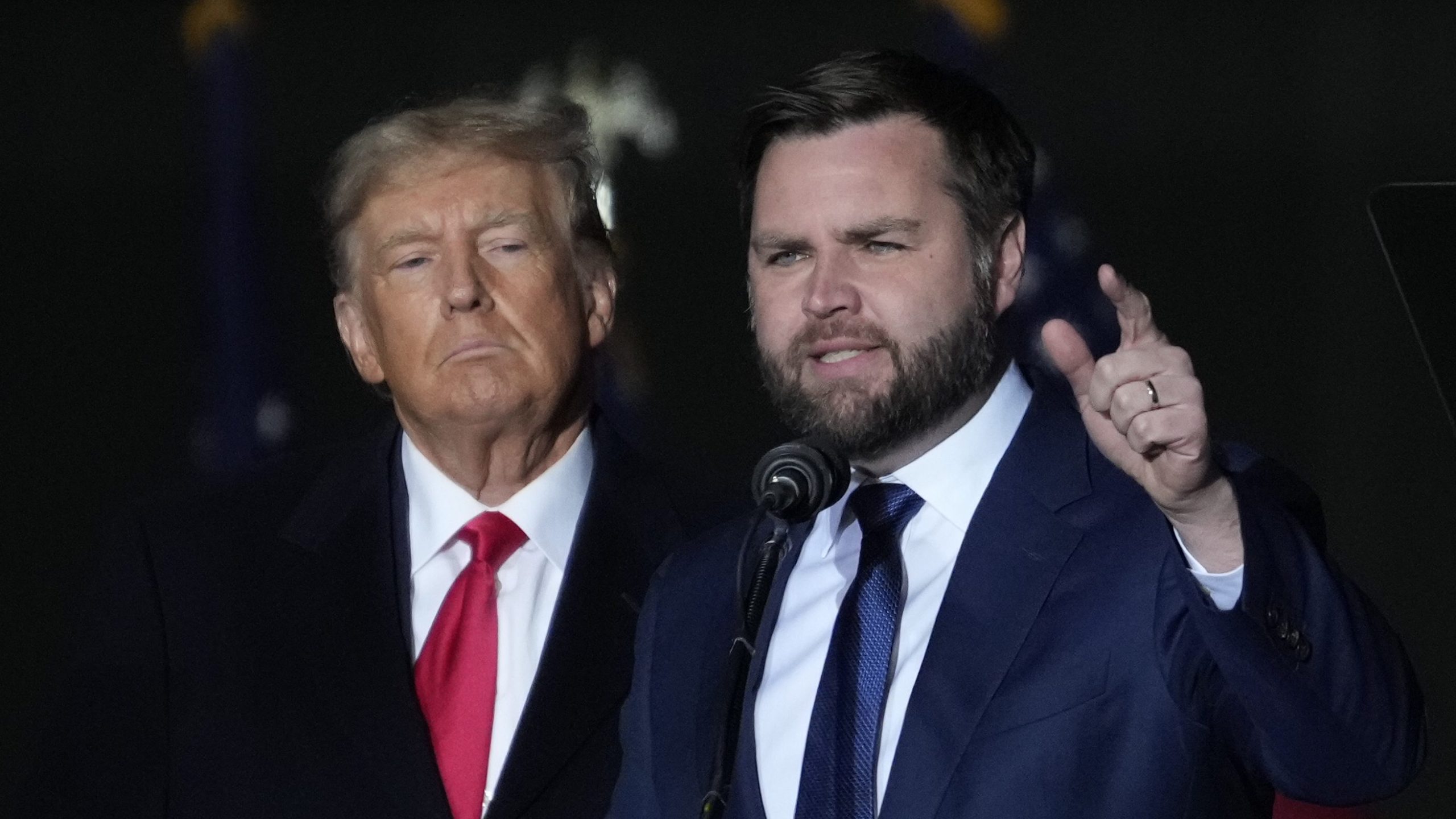 VANDALIA, OHIO - NOVEMBER 07: Former U.S. President Donald Trump and Republican candidate for U.S. Senate JD Vance greet supporters during the rally at the Dayton International Airport on November 7, 2022 in Vandalia, Ohio. Trump campaigned at the rally for Ohio Republican candidates including Republican candidate for U.S. Senate JD Vance, who is running in a tight race against Democratic candidate for U.S. Senate Rep. Tim Ryan (D-OH). (Photo by Drew Angerer/Getty Images)