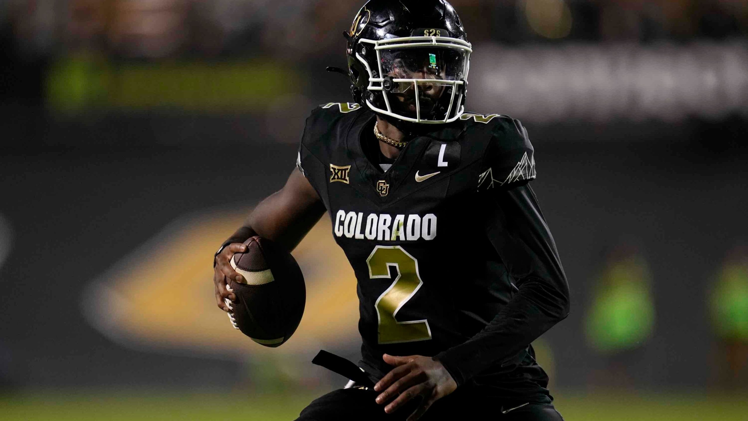 Colorado quarterback Shedeur Sanders scrambles during the second half of an NCAA college football game against North Dakota State Thursday, Aug. 29, 2024, in Boulder, Colo. (AP Photo/Jack Dempsey)