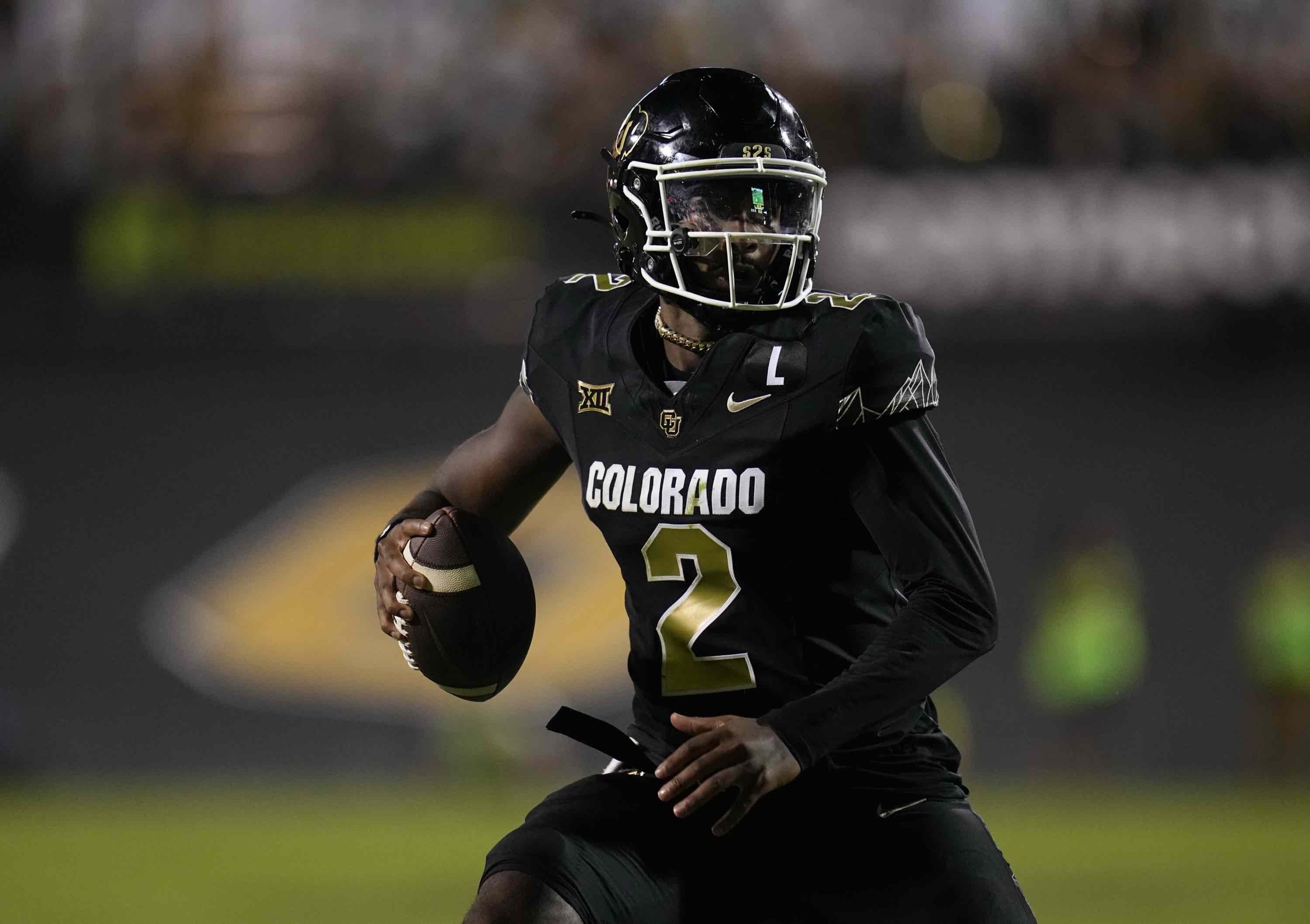 Colorado quarterback Shedeur Sanders scrambles during the second half of an NCAA college football game against North Dakota State Thursday, Aug. 29, 2024, in Boulder, Colo. (AP Photo/Jack Dempsey)