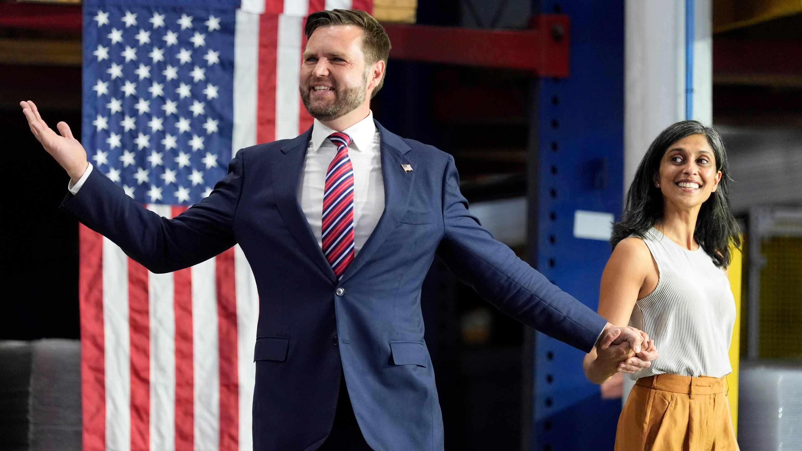 FILE - Republican vice presidential nominee Sen. JD Vance, R-Ohio, left, and his wife Usha Vance arrive at a campaign event, Aug. 28, 2024, in DePere, Wis. (AP Photo/Morry Gash, File)