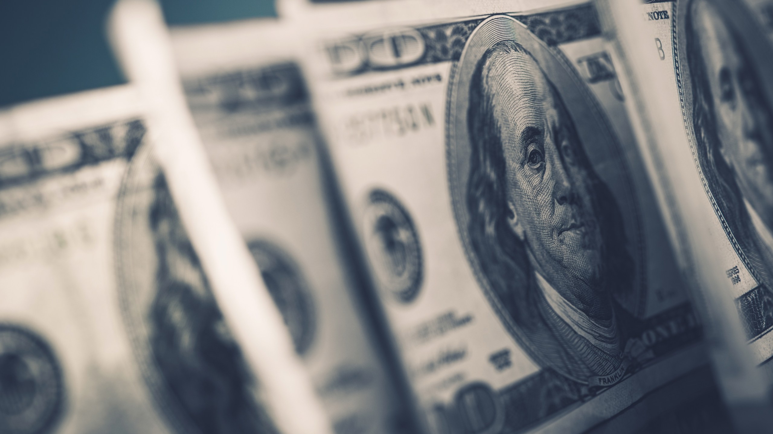 American Dollars in Focus. Benjamin Franklin One Hundred Dollars Banknotes. Dollar Trading.