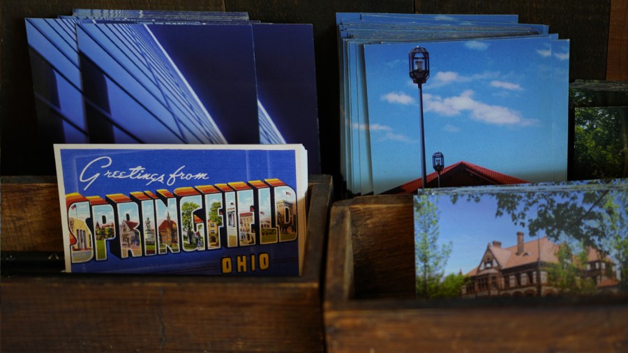 Postcards of Springfield, Ohio, are displayed in the Champion City Guide & Supply, Tuesday, Sept. 17, 2024, in Springfield, Ohio. (AP Photo/Carolyn Kaster)