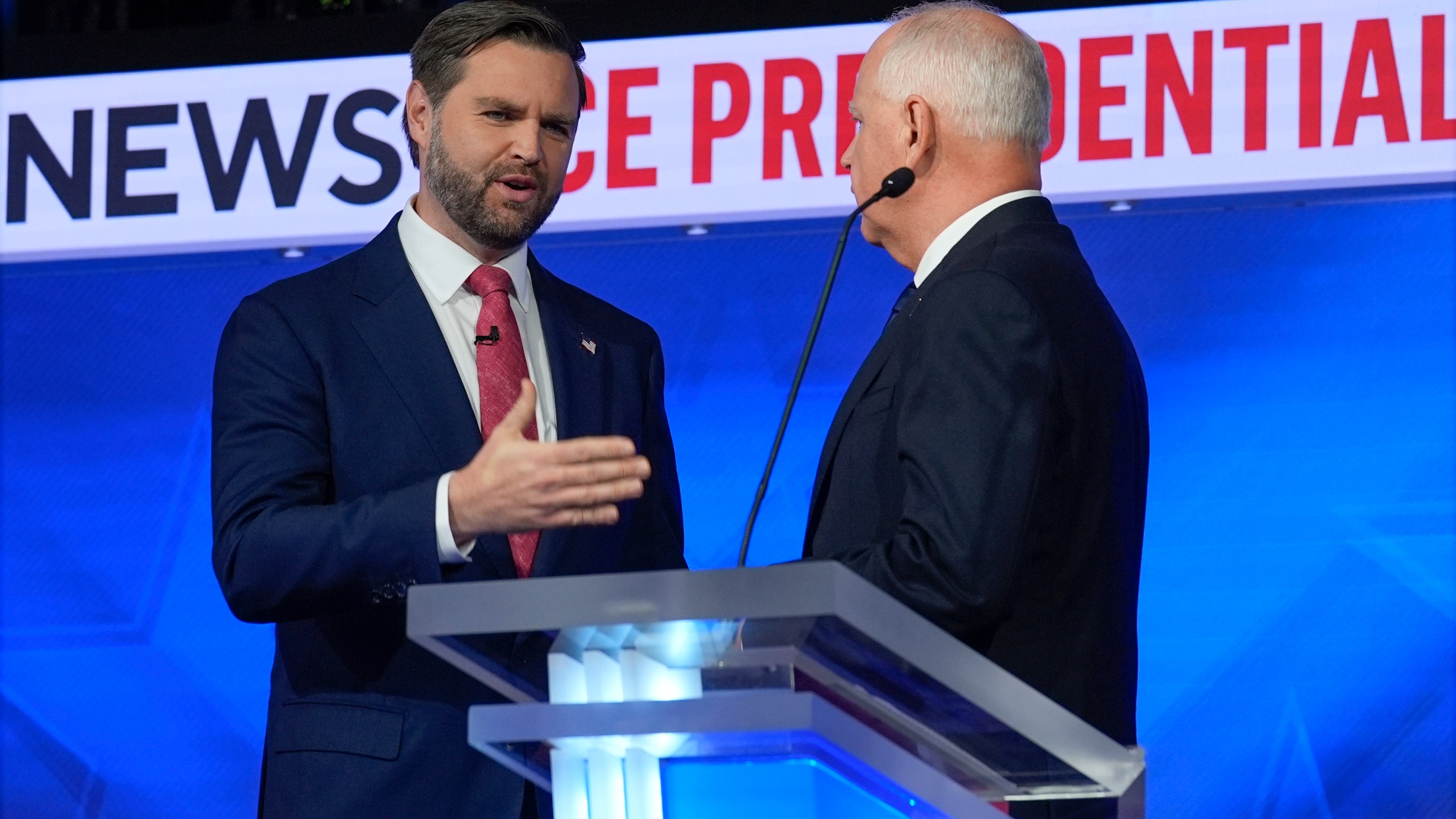 Republican vice presidential nominee Sen. JD Vance, R-Ohio, talks with Democratic vice presidential candidate Minnesota Gov. Tim Walz after the vice presidential debate hosted by CBS News Tuesday, Oct. 1, 2024, in New York. (AP Photo/Matt Rourke)