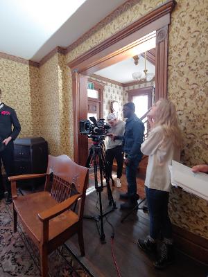 Behind the scenes shot of Kingsley Lims Nyarko directing a scene