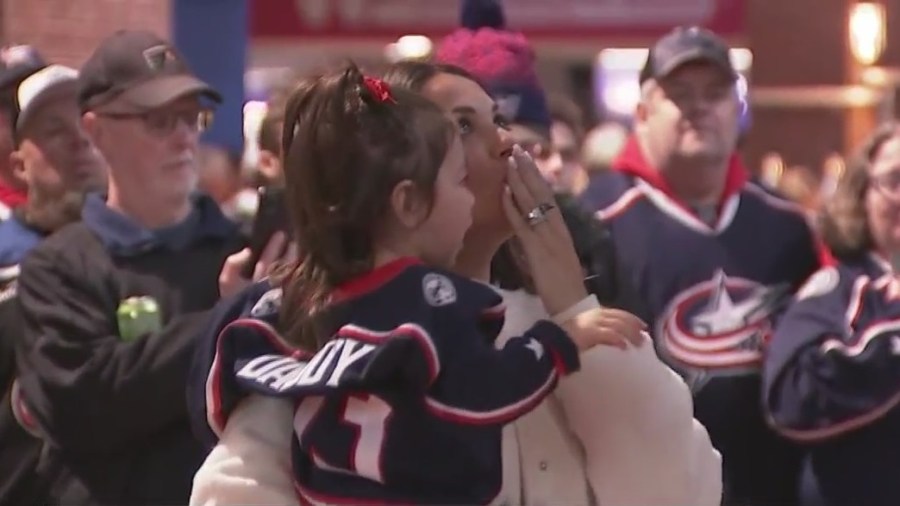 Meredith Gaudreau and her daughter spent time at the memorial for her husband Johnny Gaudreau and his brother Matthew Gaudreau before the Blue Jackets 2024 home opener. (NBC4)