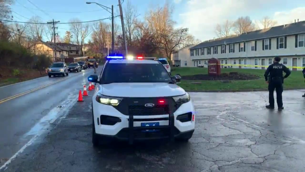 Columbus police set up crime scene tape Nov. 20, 2024 in the area of an officer-involved shooting. (NBC4 Photo/Steve Wainfor)