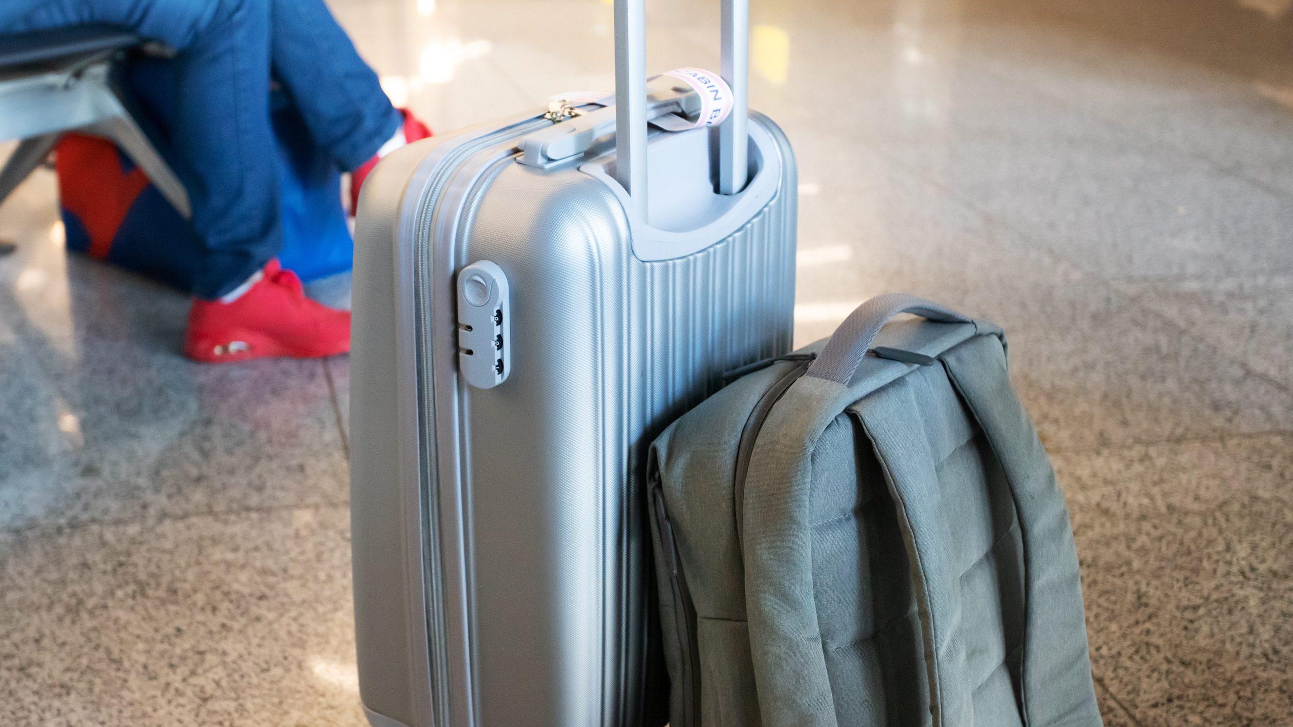 baggage suitcase and hand luggage backpack in airport hall