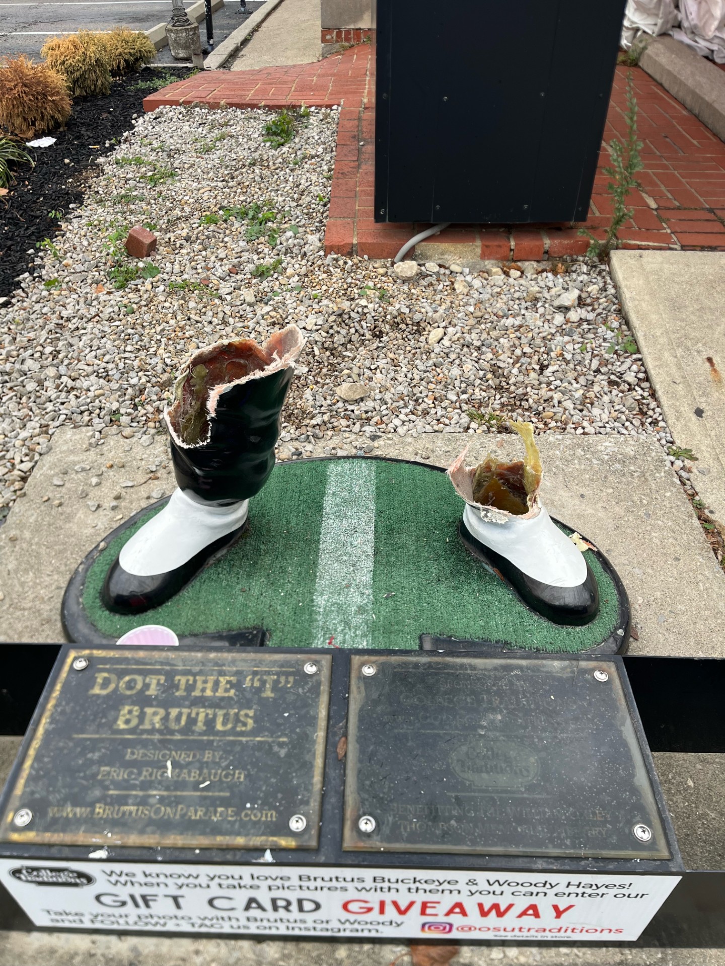 The shoes of the Brutus the Buckeye statue that was vandalized sometime overnight on Nov. 23 at College Traditions on West Lane Avenue in Columbus near the Ohio State University campus. (COLLEGE TRADITIONS)
