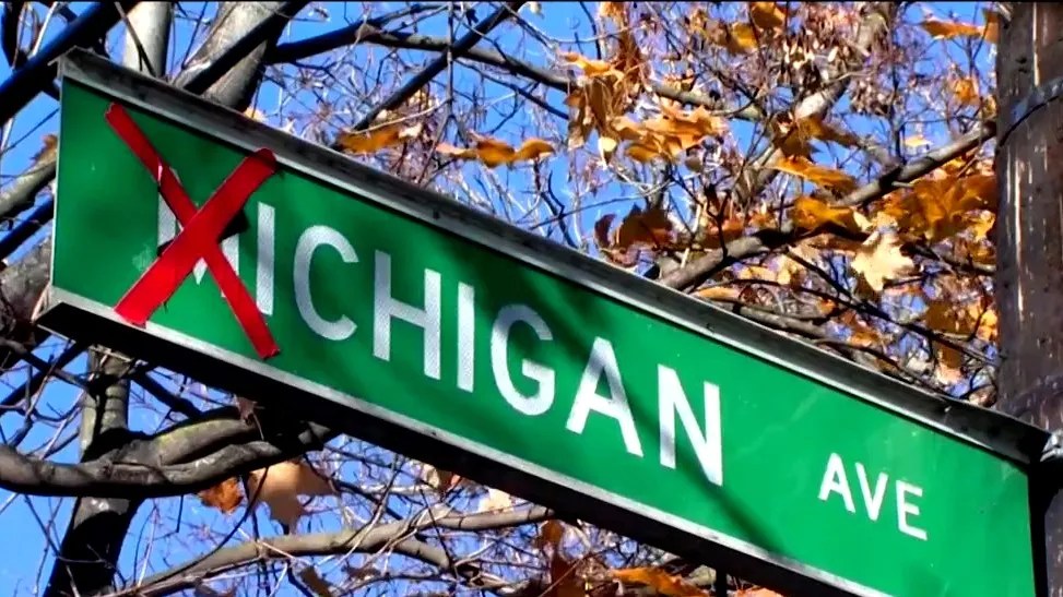 M crossed out on Michigan Avenue street sign in Columbus