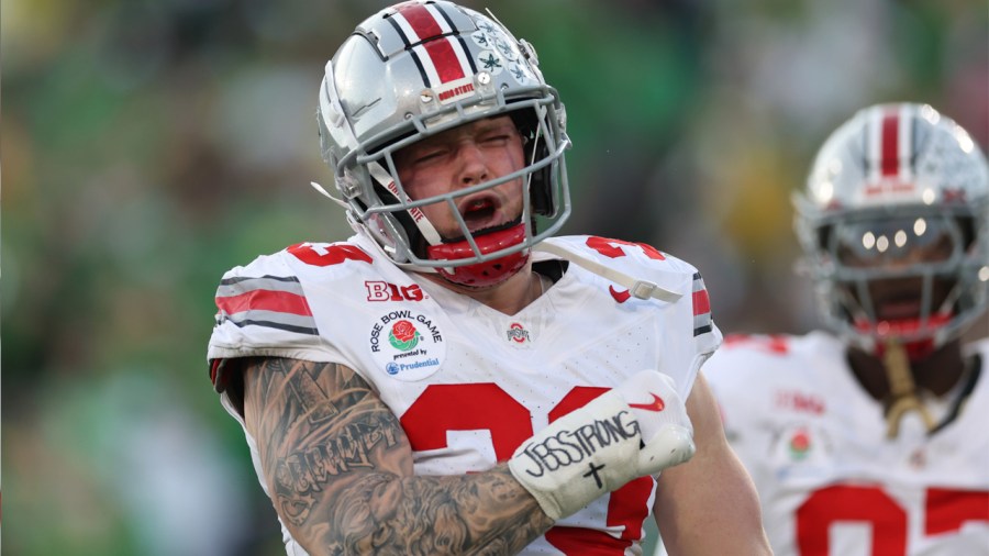 PASADENA, CALIFORNIA - JANUARY 01: Jack Sawyer #33 of the Ohio State Buckeyes reacts during the third quarter against the Oregon Ducks during the Rose Bowl Game Presented by Prudential at Rose Bowl Stadium on January 01, 2025 in Pasadena, California. (Photo by Sean M. Haffey/Getty Images)