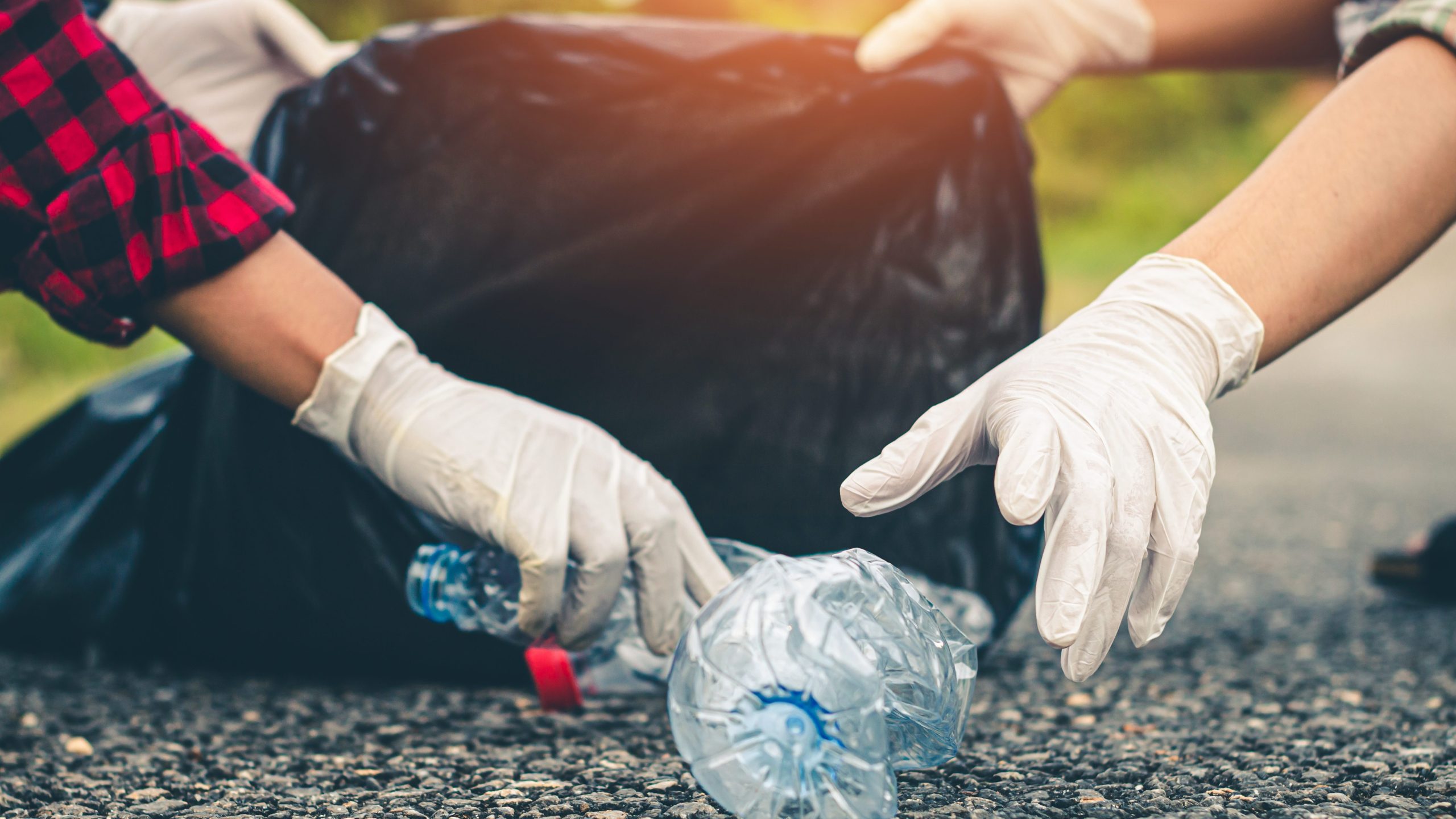 Women volunteer help garbage collection for to recycling environment.