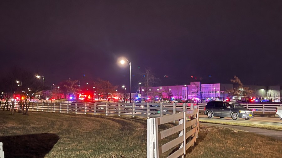 Cars line up along with law enforcement vehicles outside the KDC/One building in New Albany following a shooting Tuesday, Feb. 4, 2025. (NBC 4)