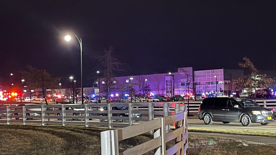 Cars line up along with law enforcement vehicles outside the KDC/One building in New Albany following a shooting Tuesday, Feb. 4, 2025. (NBC 4)
