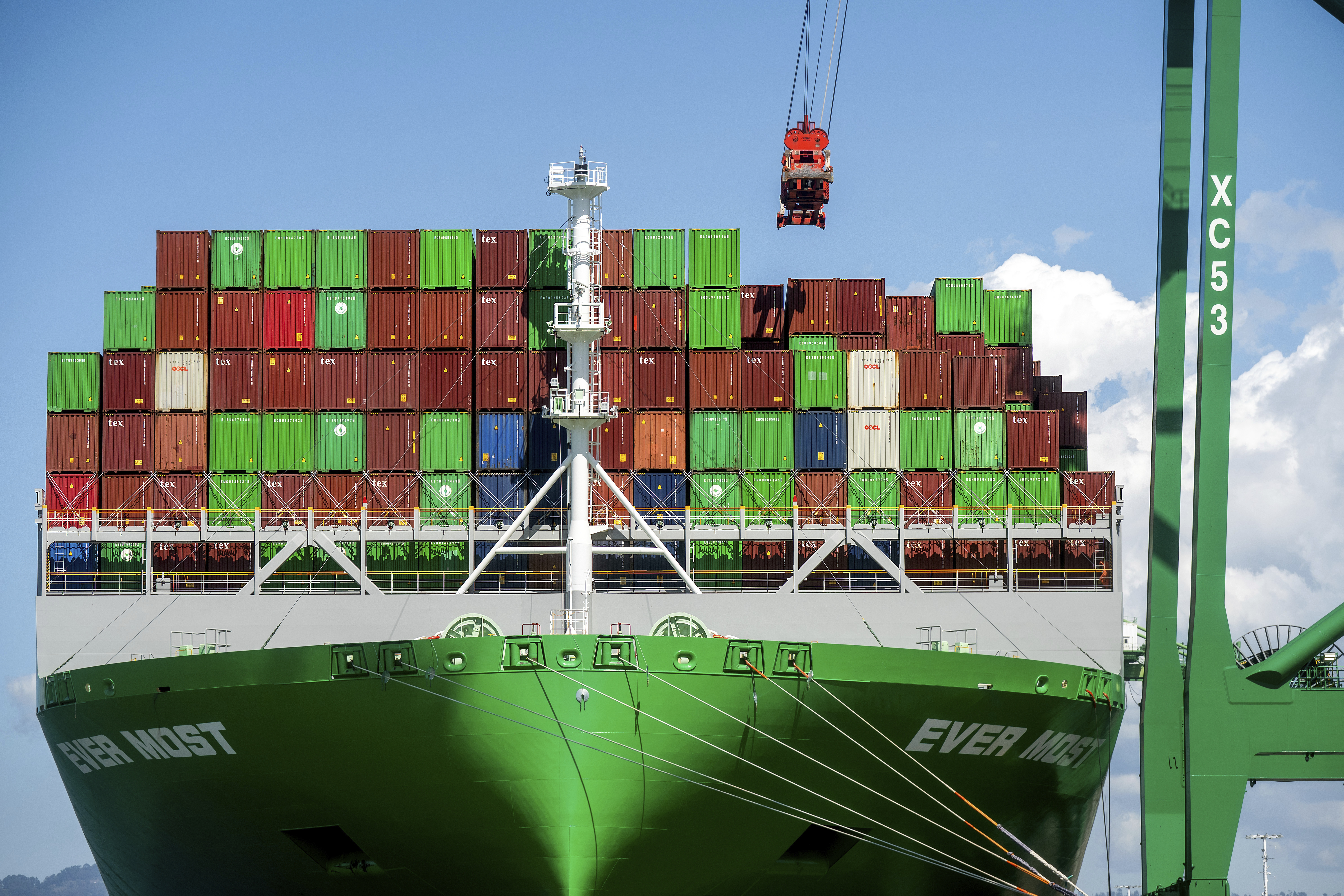 Shipping containers line the Ever Most cargo vessel docked at the Port of Oakland on Thursday, April 3, 2025, in Oakland, Calif. (AP Photo/Noah Berger)