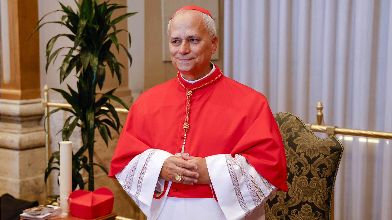 FILE - Cardinal Robert Francis Prevost, Prefect of the Dicastery for Bishops, poses for a photo at the end of the consistory where Pope Francis elevated 21 new cardinals in St. Peter's Square at The Vatican, Sept. 30, 2023. (AP Photo/Riccardo De Luca, File)