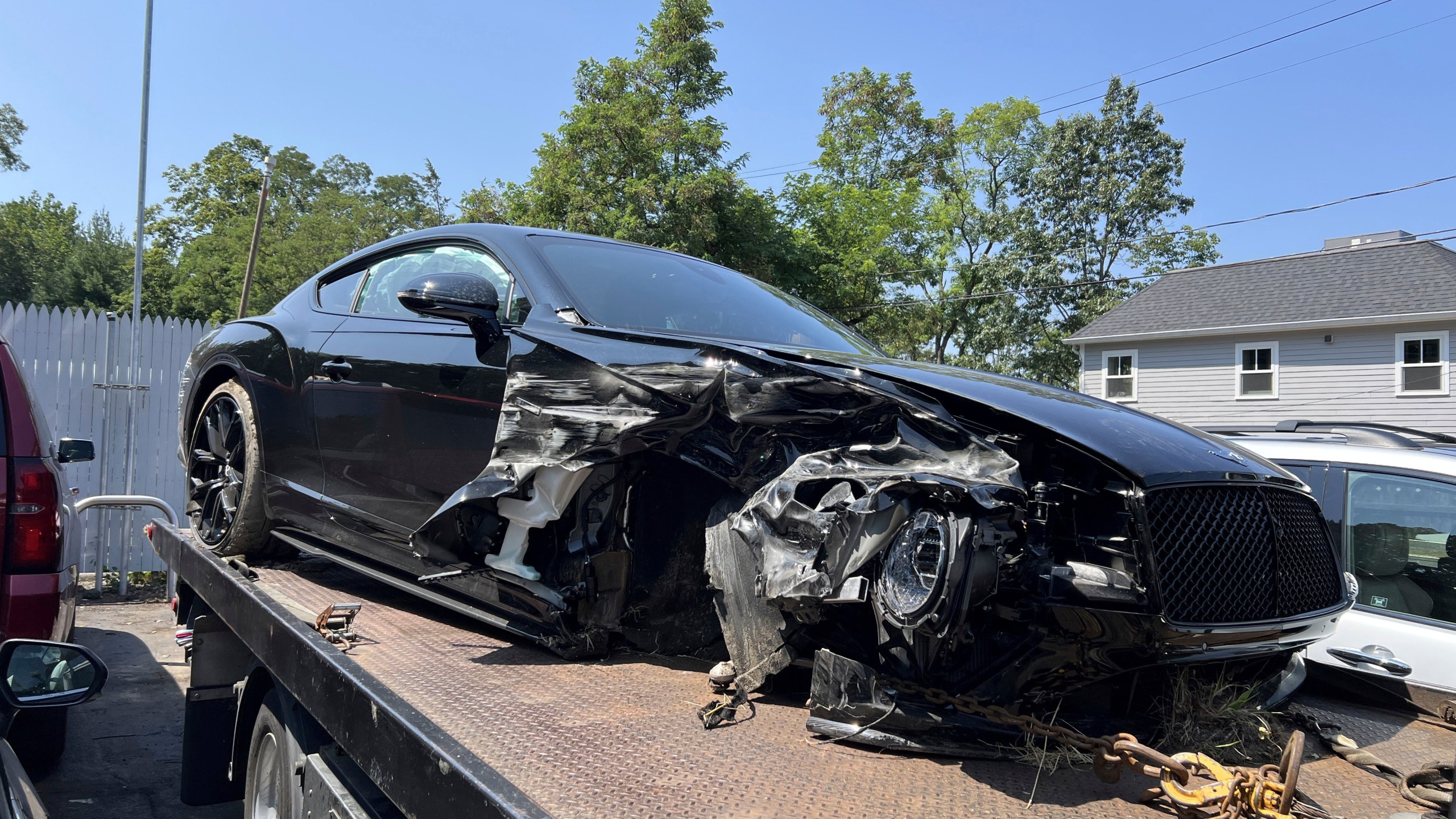 FILE - This July 24, 2025 photo provided by by Barbara Doran shows Vince McMahon's damaged vehicle on a tow truck in Westport, Conn, where the car was towed to after an accident. (Barbara Doran via AP, File)