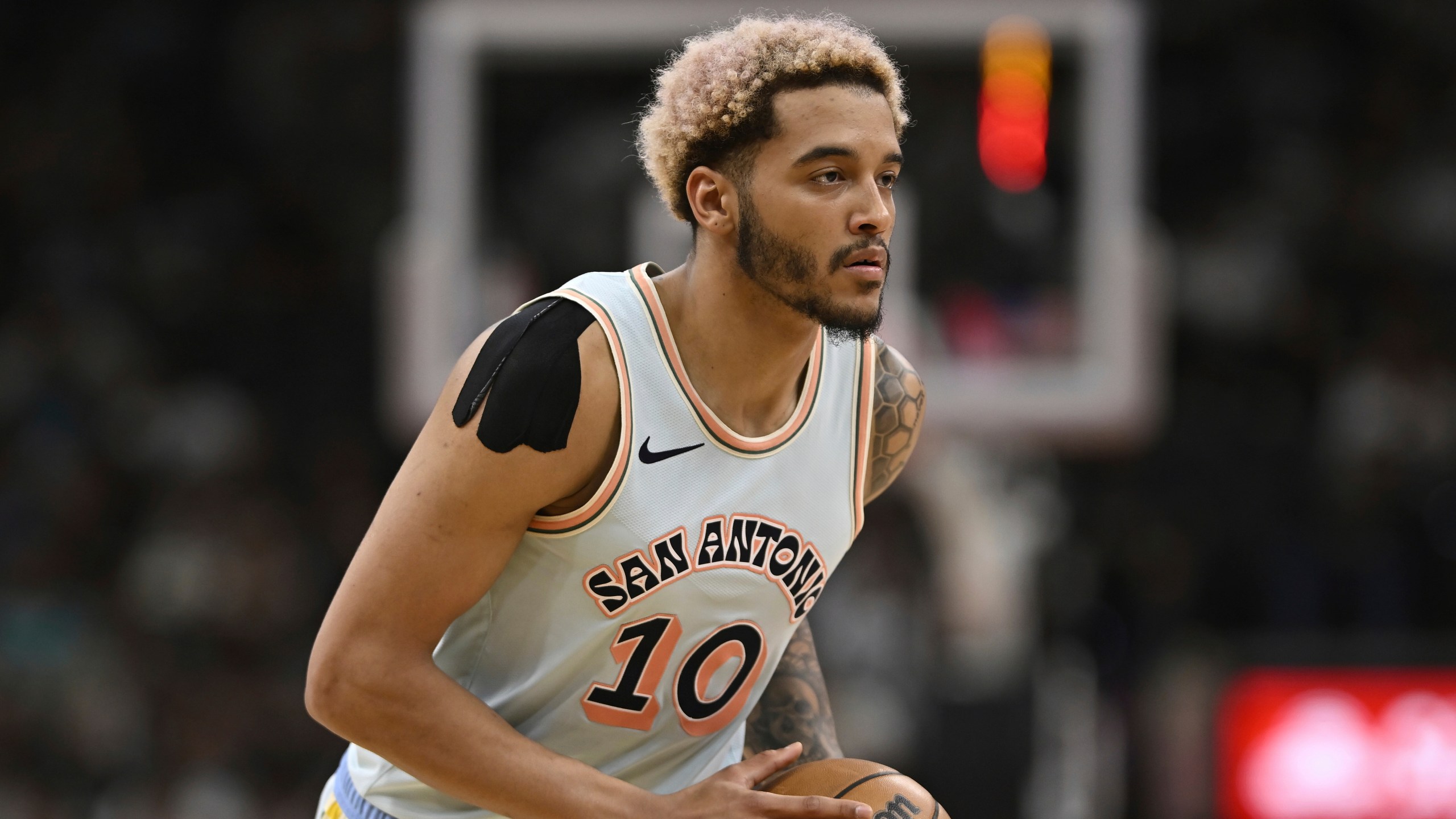 FILE - San Antonio Spurs' Jeremy Sochan runs up court during an NBA basketball game against the Boston Celtics, March 29, 2025, in San Antonio. (AP Photo/Darren Abate, File)