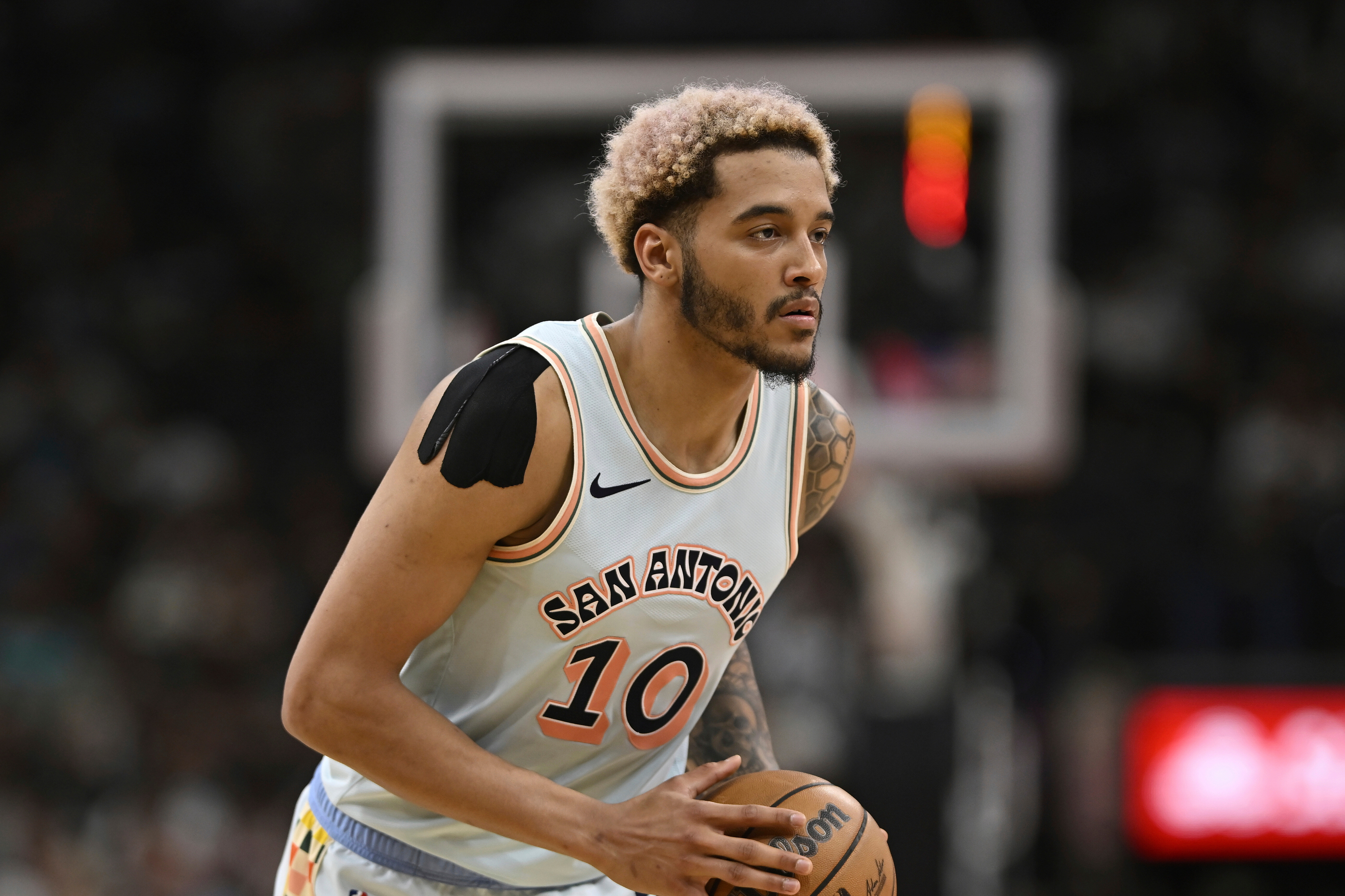 FILE - San Antonio Spurs' Jeremy Sochan runs up court during an NBA basketball game against the Boston Celtics, March 29, 2025, in San Antonio. (AP Photo/Darren Abate, File)