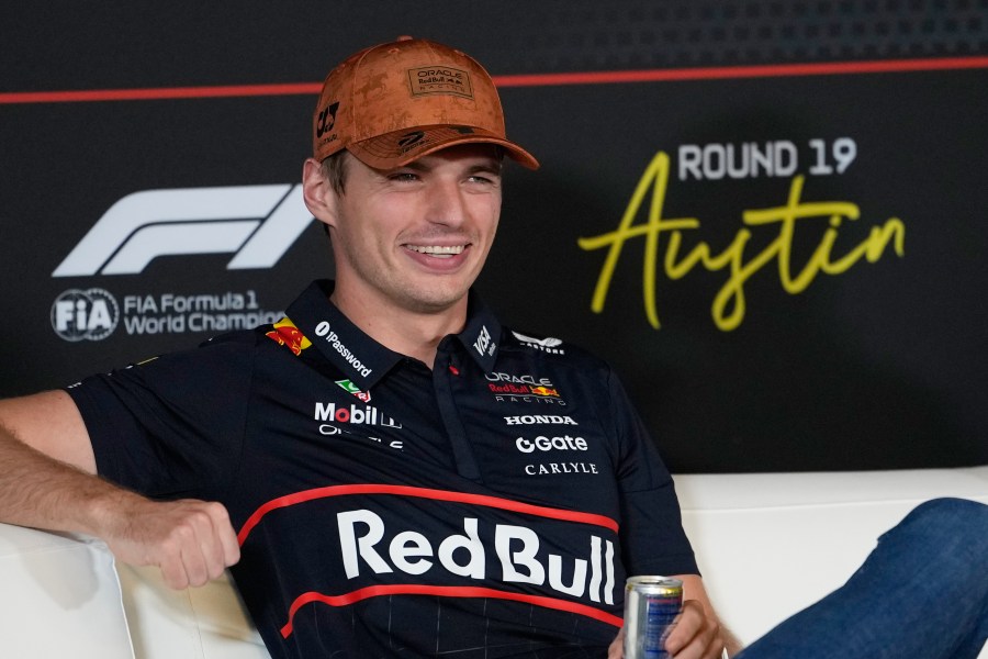 Red Bull driver Max Verstappen of the Netherlands smiles during a news conference for the Formula One U.S. Grand Prix auto race at the Circuit of the Americas, Thursday, Oct. 16, 2025, in Austin, Texas. (AP Photo/John Locher)