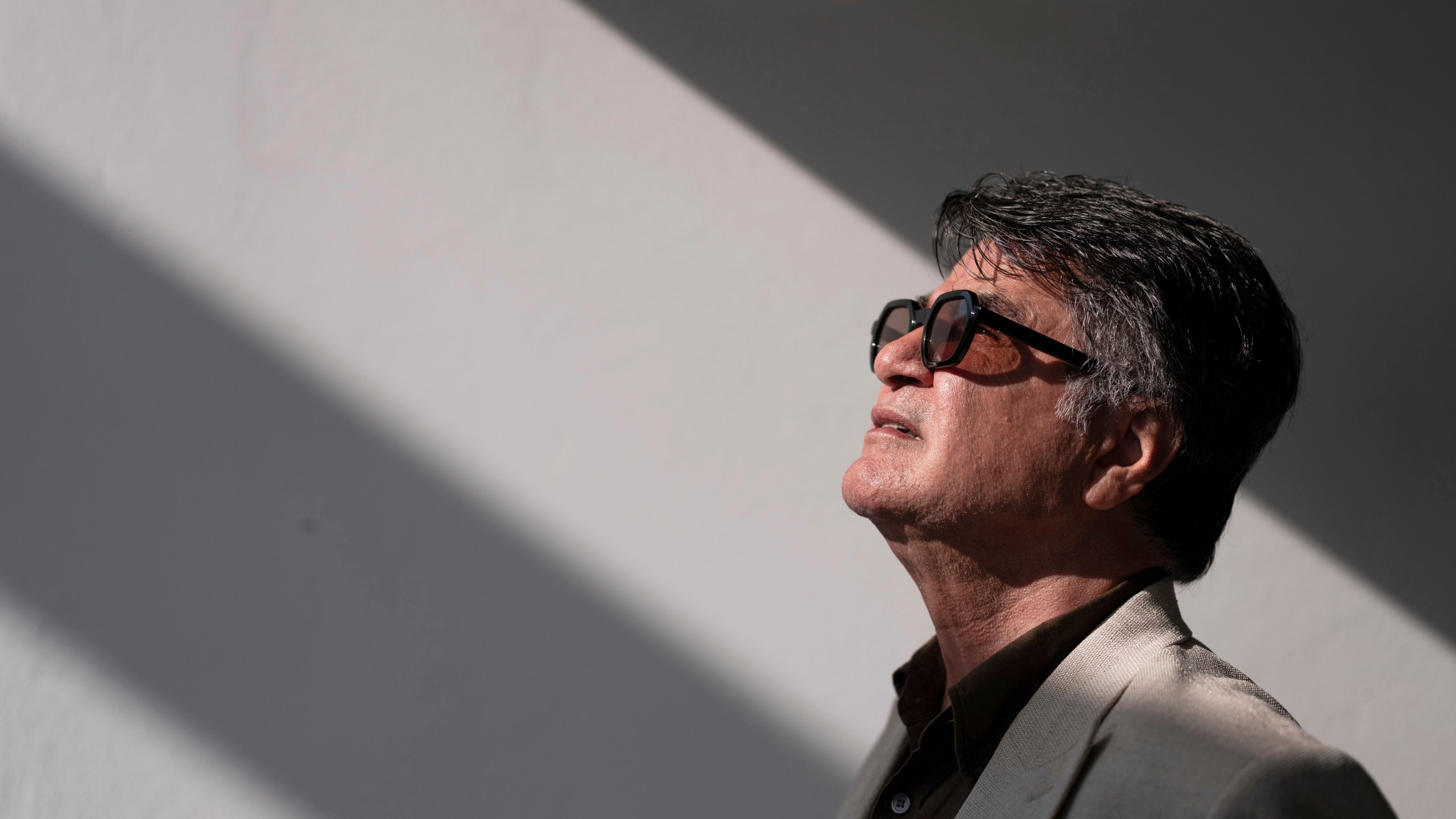 FILE - Director Jafar Panahi poses for a portrait photograph for the film "It Was Just an Accident" at the 78th international film festival, Cannes, southern France, on May 21, 2025. (Photo by Scott A Garfitt/Invision/AP, File)