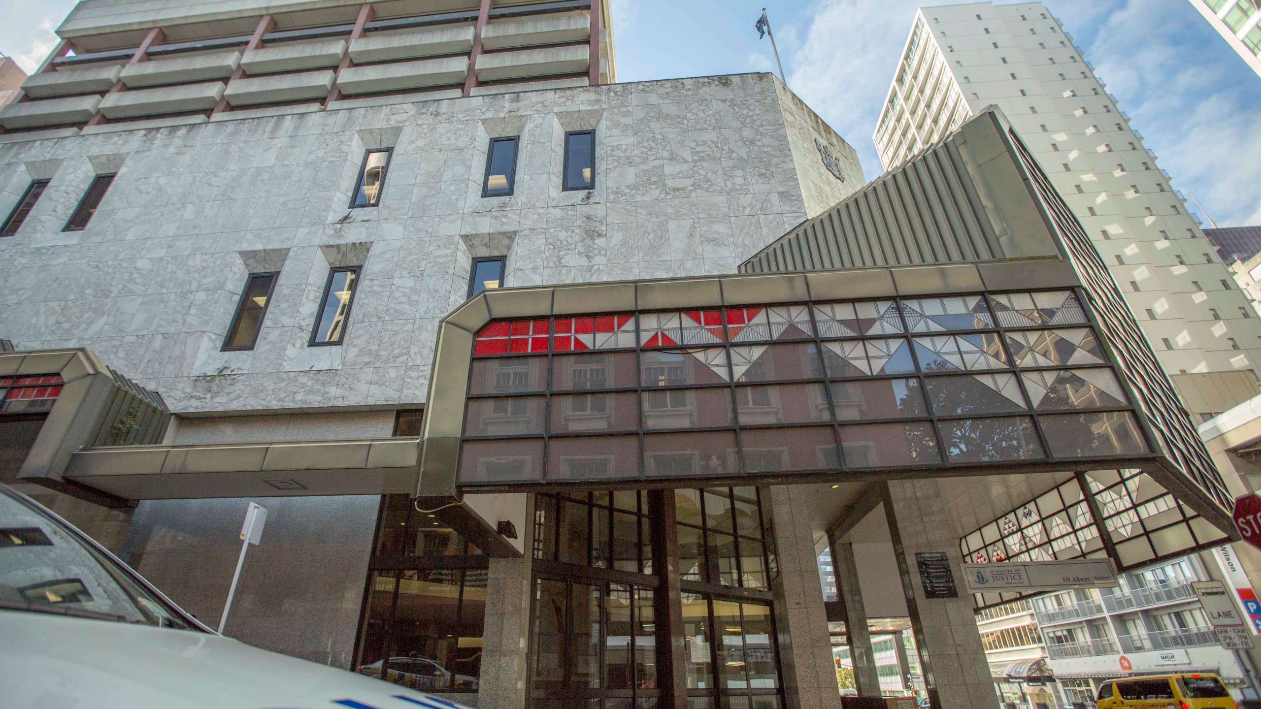 A police car is parked outside the Auckland District Court in Auckland, New Zealand, Aug. 17, 2015. (Bevan Read/Fairfax NZ/STUFF via AP)
