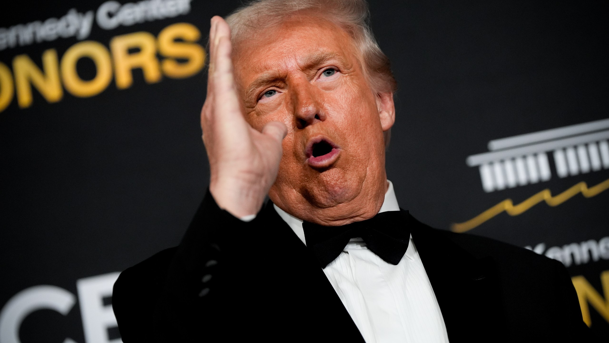 President Donald Trump speaks on the red carpet before the 48th Kennedy Center Honors, Sunday, Dec. 7, 2025, at the John F. Kennedy Center for the Performing Arts in Washington. (AP Photo/Julia Demaree Nikhinson)