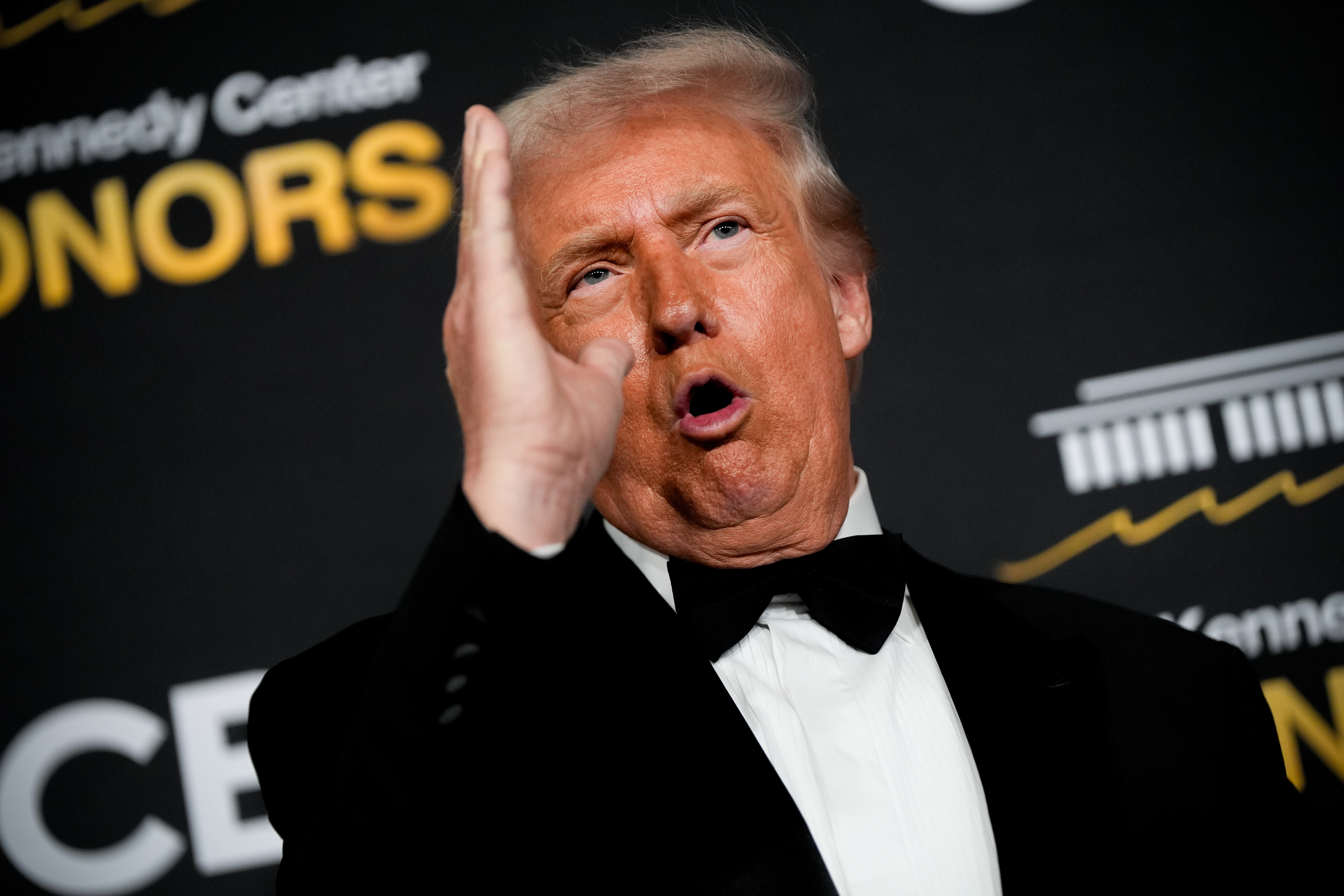 President Donald Trump speaks on the red carpet before the 48th Kennedy Center Honors, Sunday, Dec. 7, 2025, at the John F. Kennedy Center for the Performing Arts in Washington. (AP Photo/Julia Demaree Nikhinson)