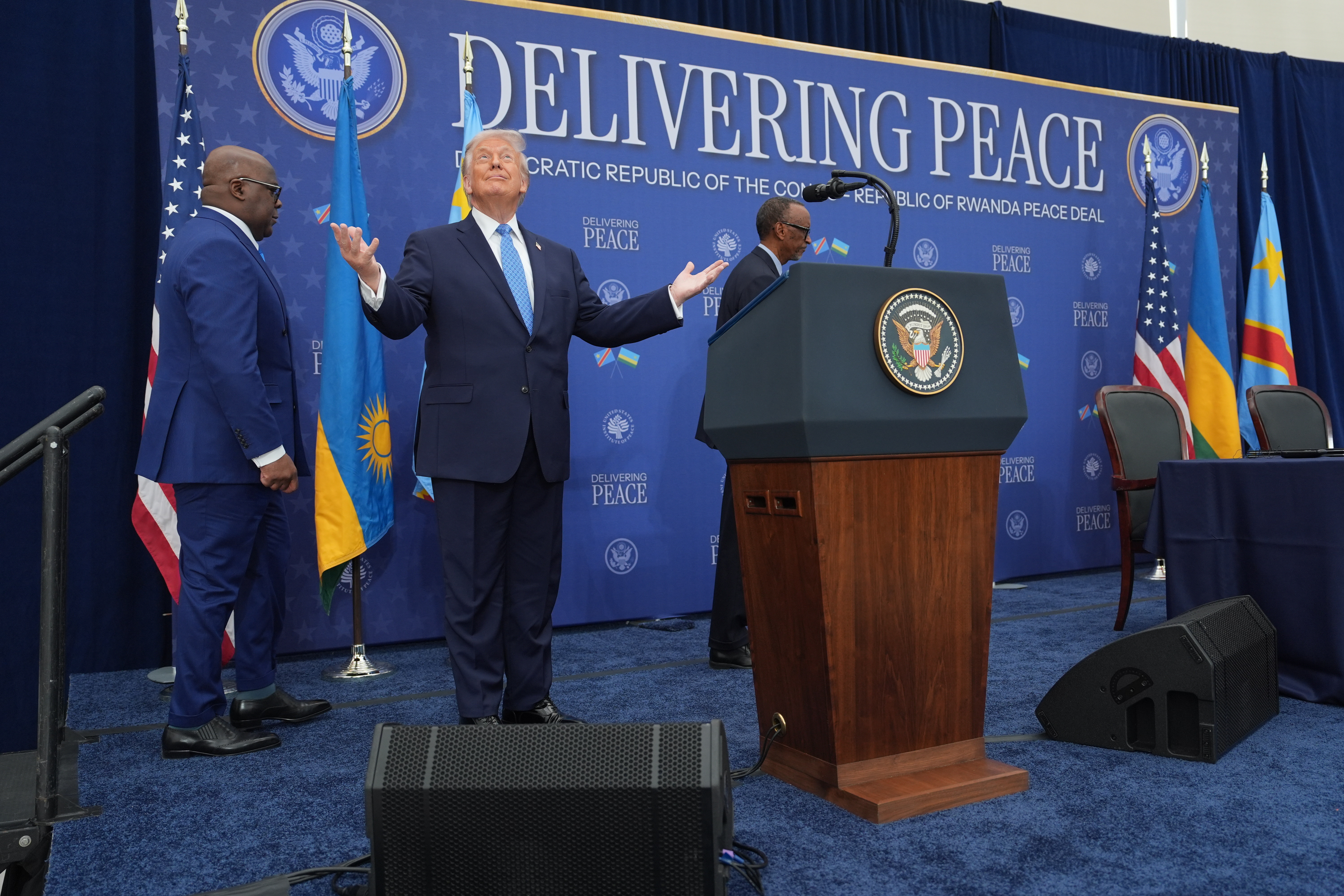President Donald Trump arrives for a signing ceremony with Rwanda's President Paul Kagame and Democratic Republic of Congo President Felix-Antoine Tshisekedi at the U.S. Institute of Peace, Thursday, Dec. 4, 2025, in Washington. (AP Photo/Evan Vucci)